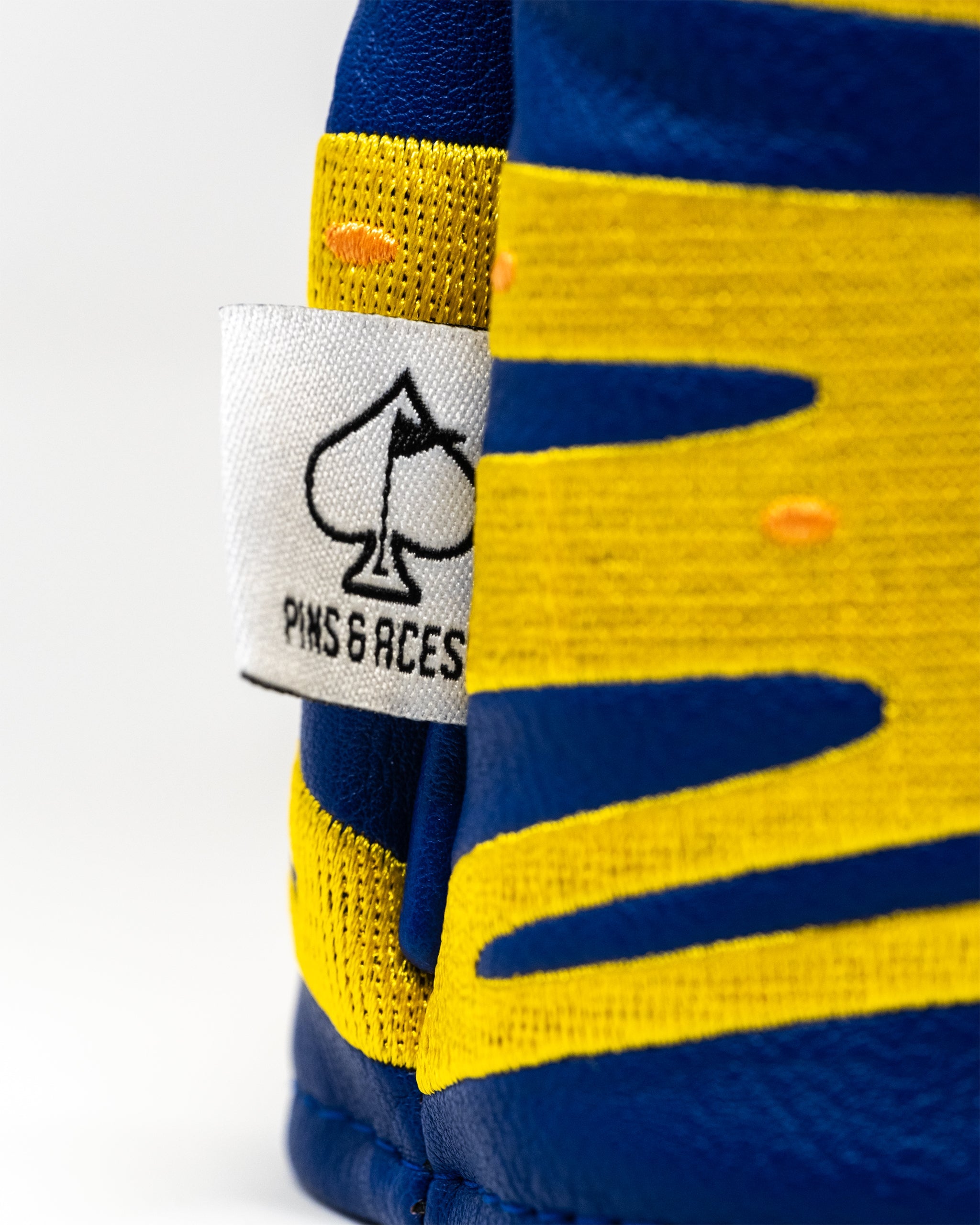 Pizza-themed driver cover for golf clubs, featuring a colorful pizza slice design with vibrant toppings.