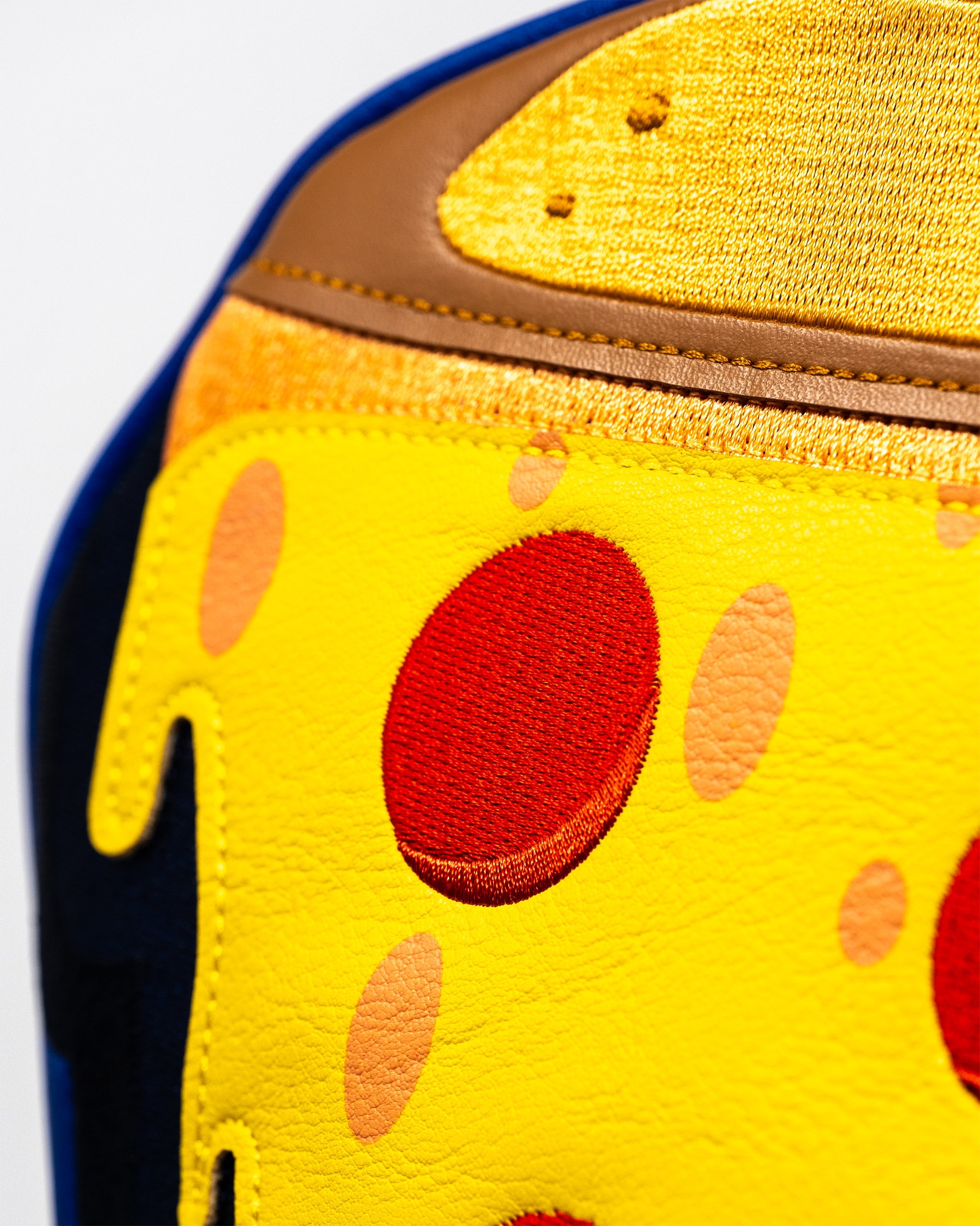 Pizza-themed driver cover for golf clubs, featuring a realistic pizza slice design with vibrant colors and texture.