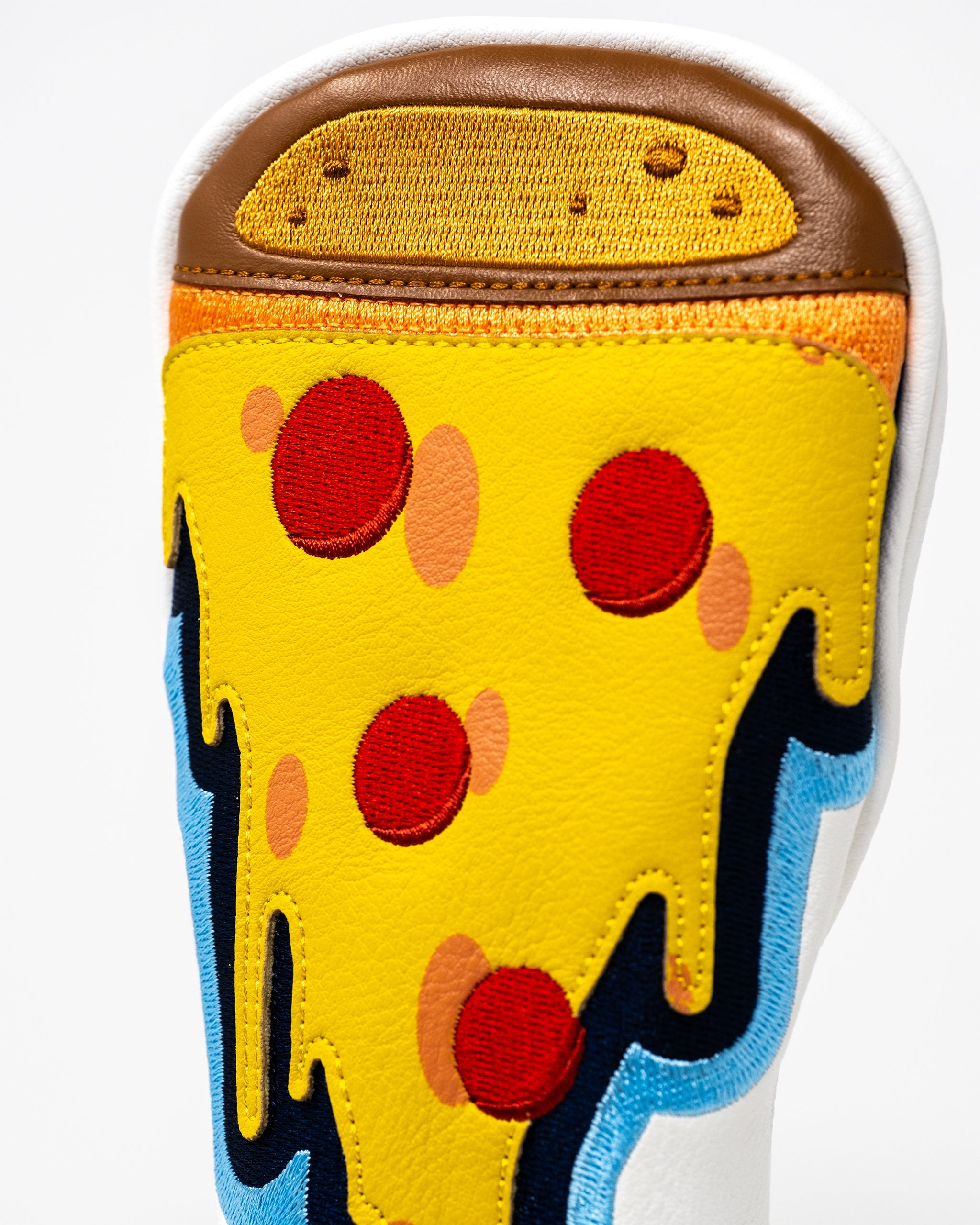 Hybrid golf club cover featuring a colorful pizza design.