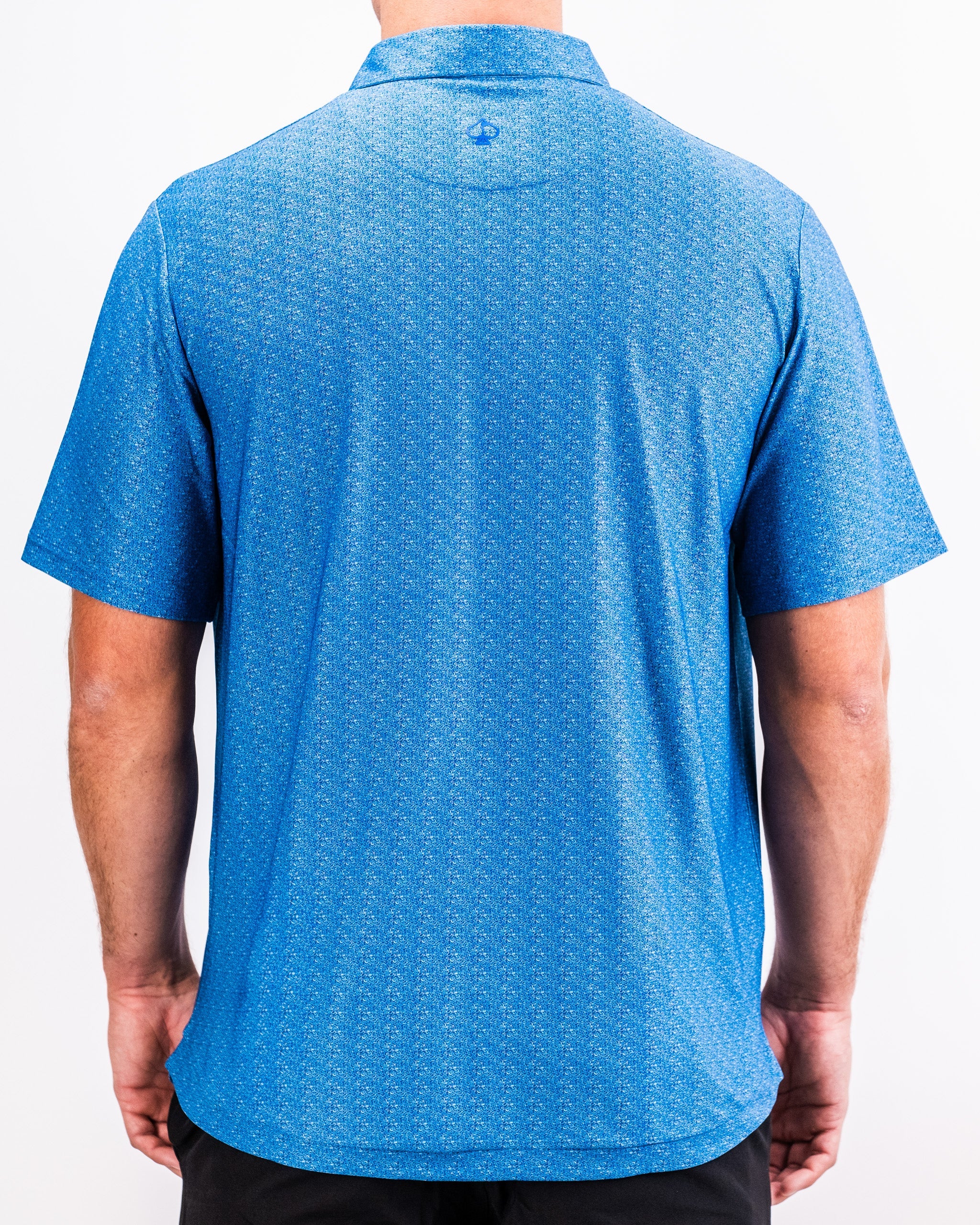 Player Preferred™ Polo in Cosmic Swirl design featuring vibrant colors and a modern fit.