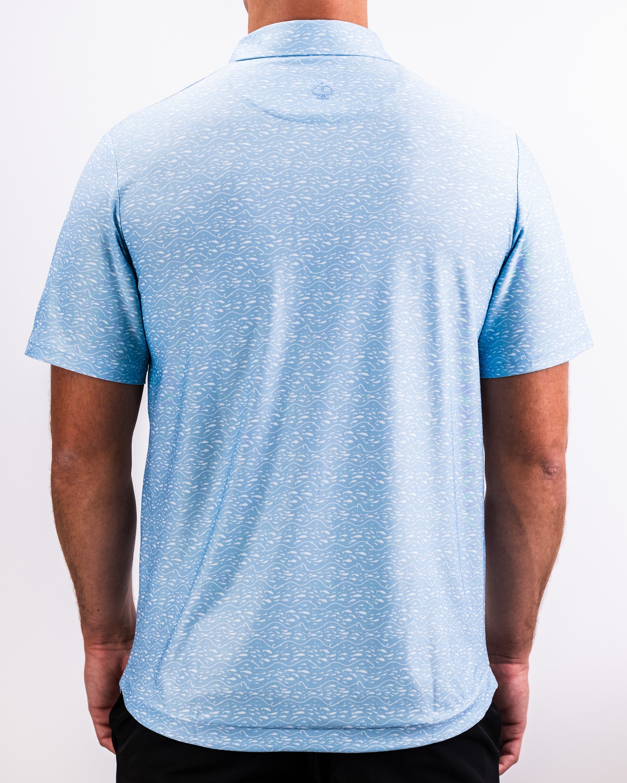 Player Preferred™ Polo in Tidal Flow color featuring a relaxed fit and moisture-wicking fabric, displayed on a white background.