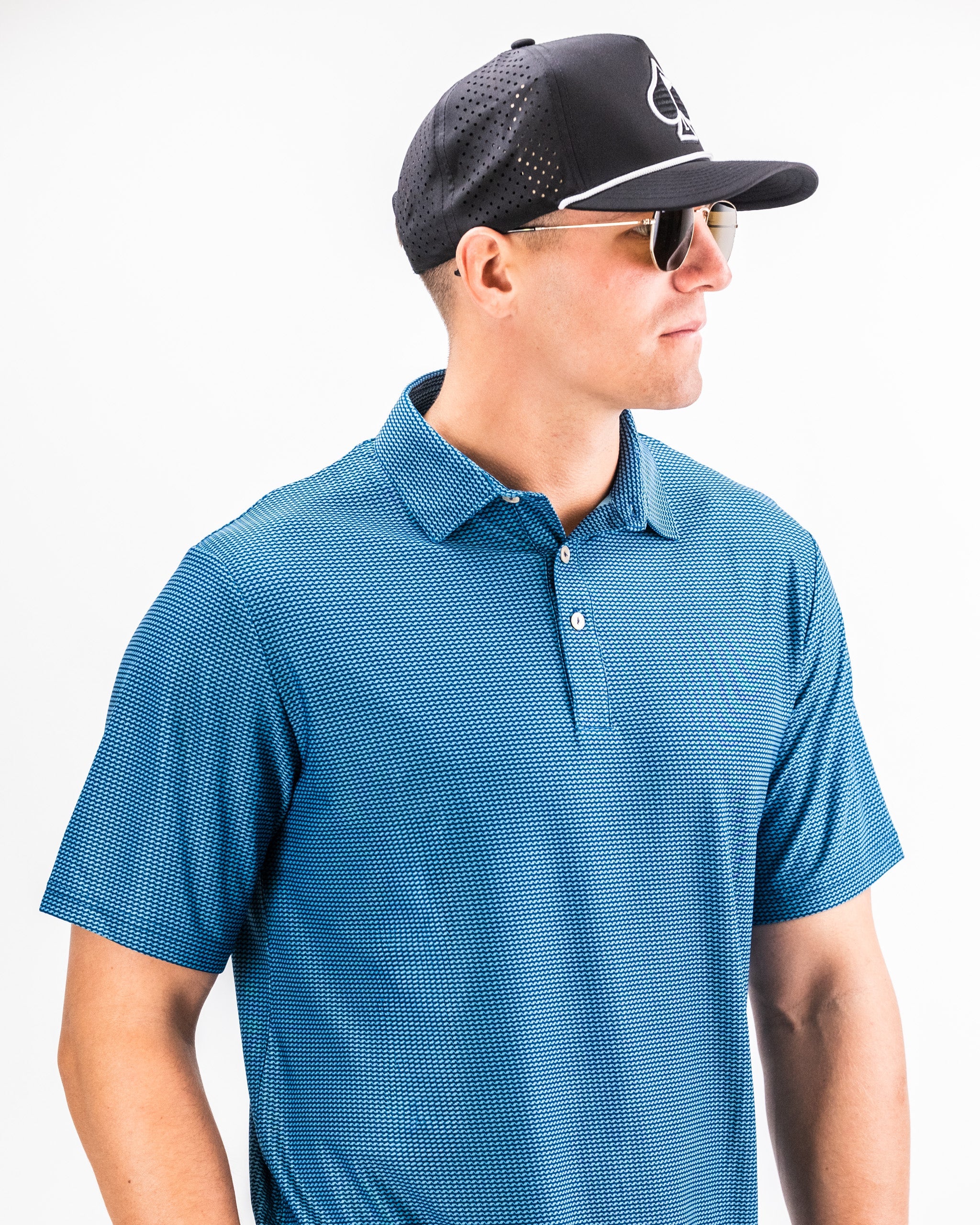 Ocean Wave Player Preferred™ Polo in vibrant blue color, featuring a classic collar and short sleeves, displayed against a neutral background.