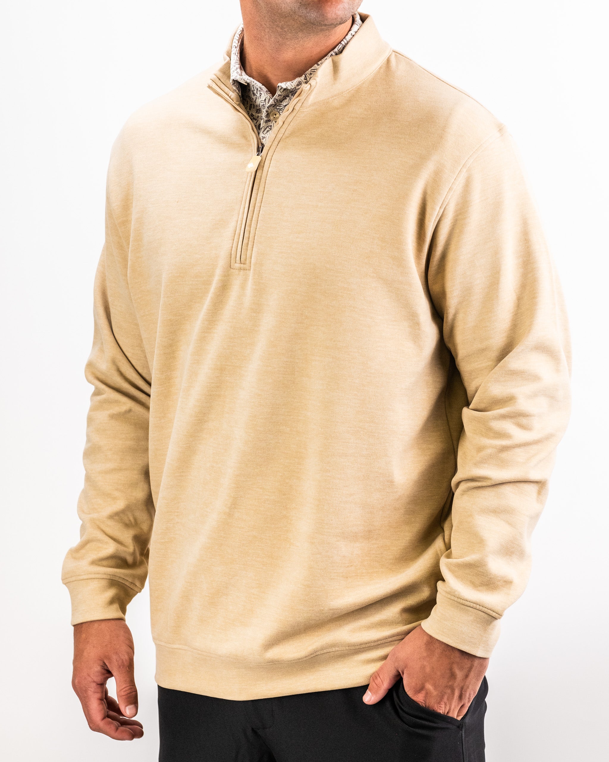 Men's beige Player Preferred™ Pullover in sand color, featuring a quarter-zip collar and relaxed fit.