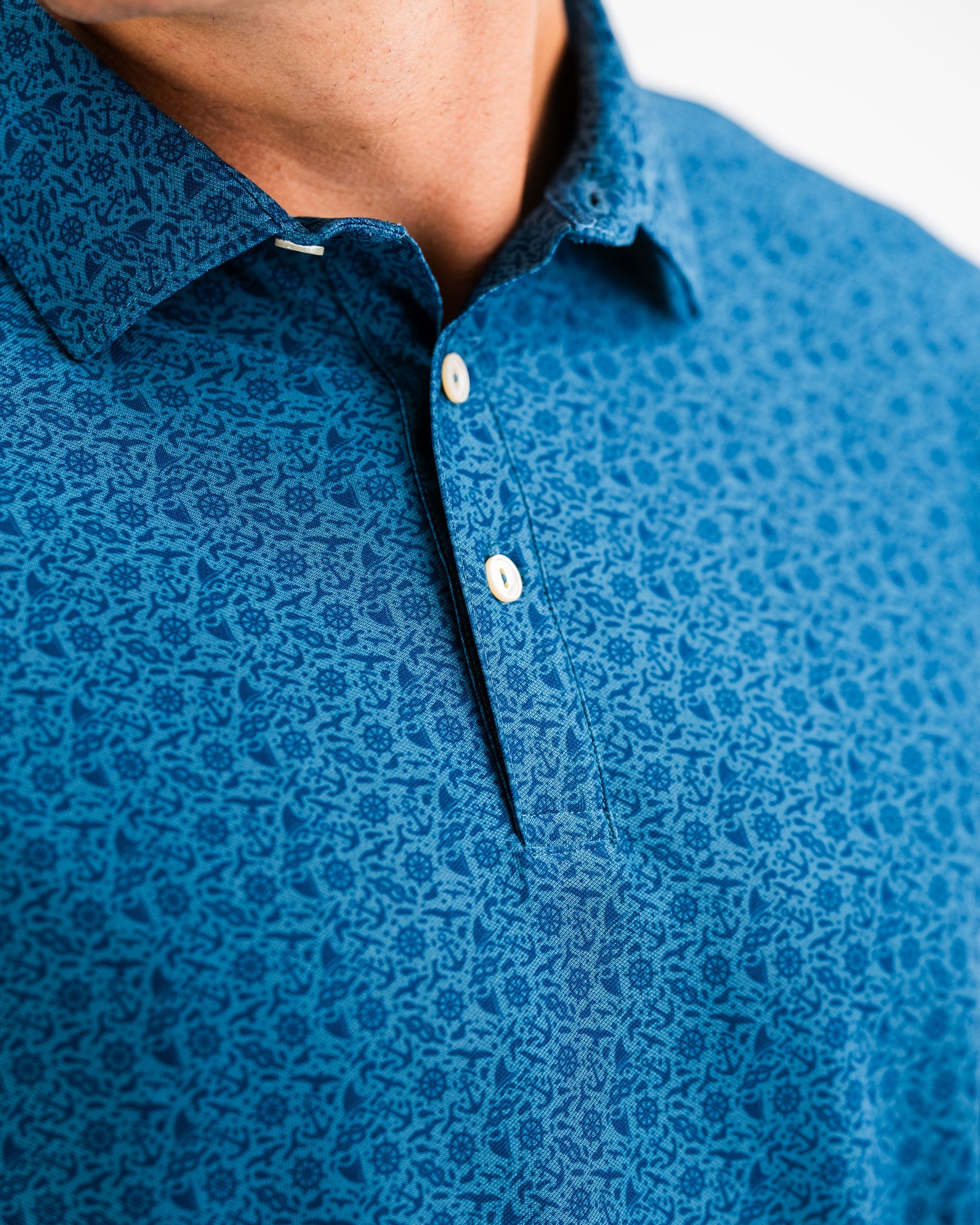 Player Preferred™ Polo - The Mariner in navy blue, featuring a classic collar and short sleeves, displayed on a clean background.