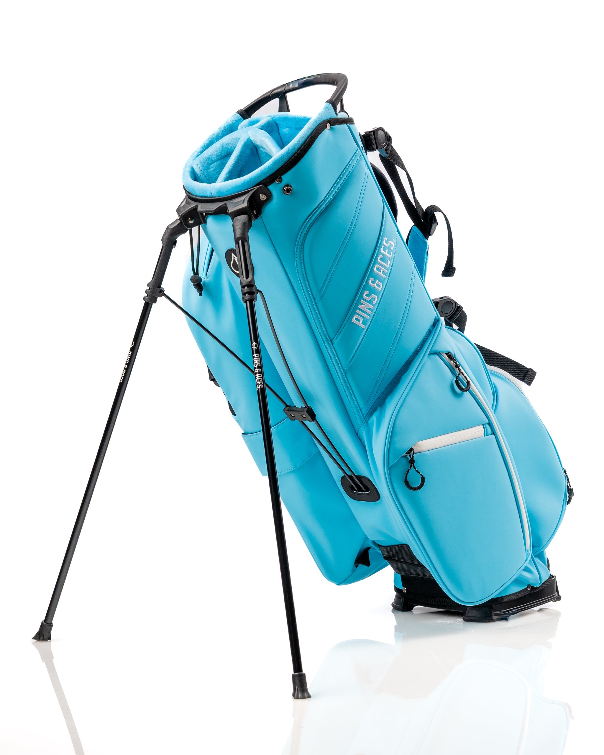 Light blue Player Preferred™ Golf Bag with a stand, featuring multiple pockets and a sleek design for stylish golfers.