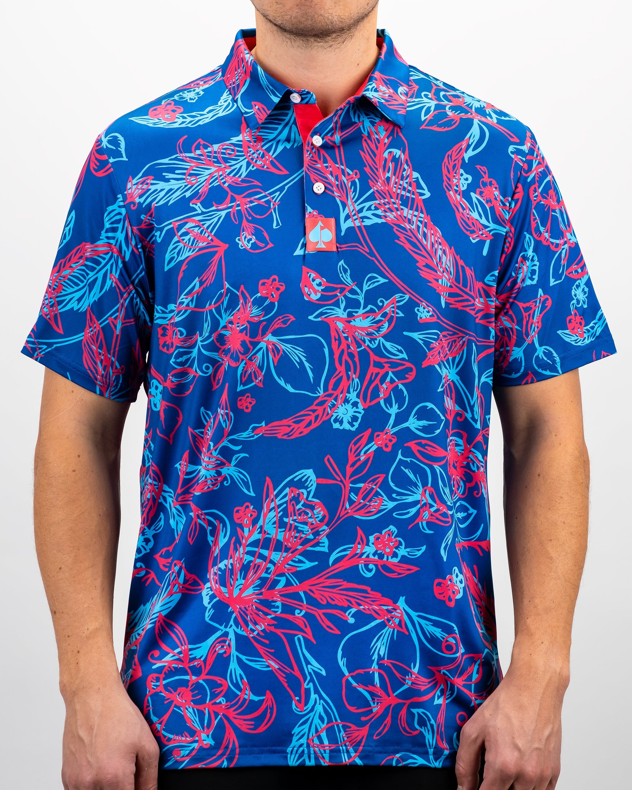 Cabo Colada men's polo shirt in vibrant turquoise with short sleeves, modeled outdoors.