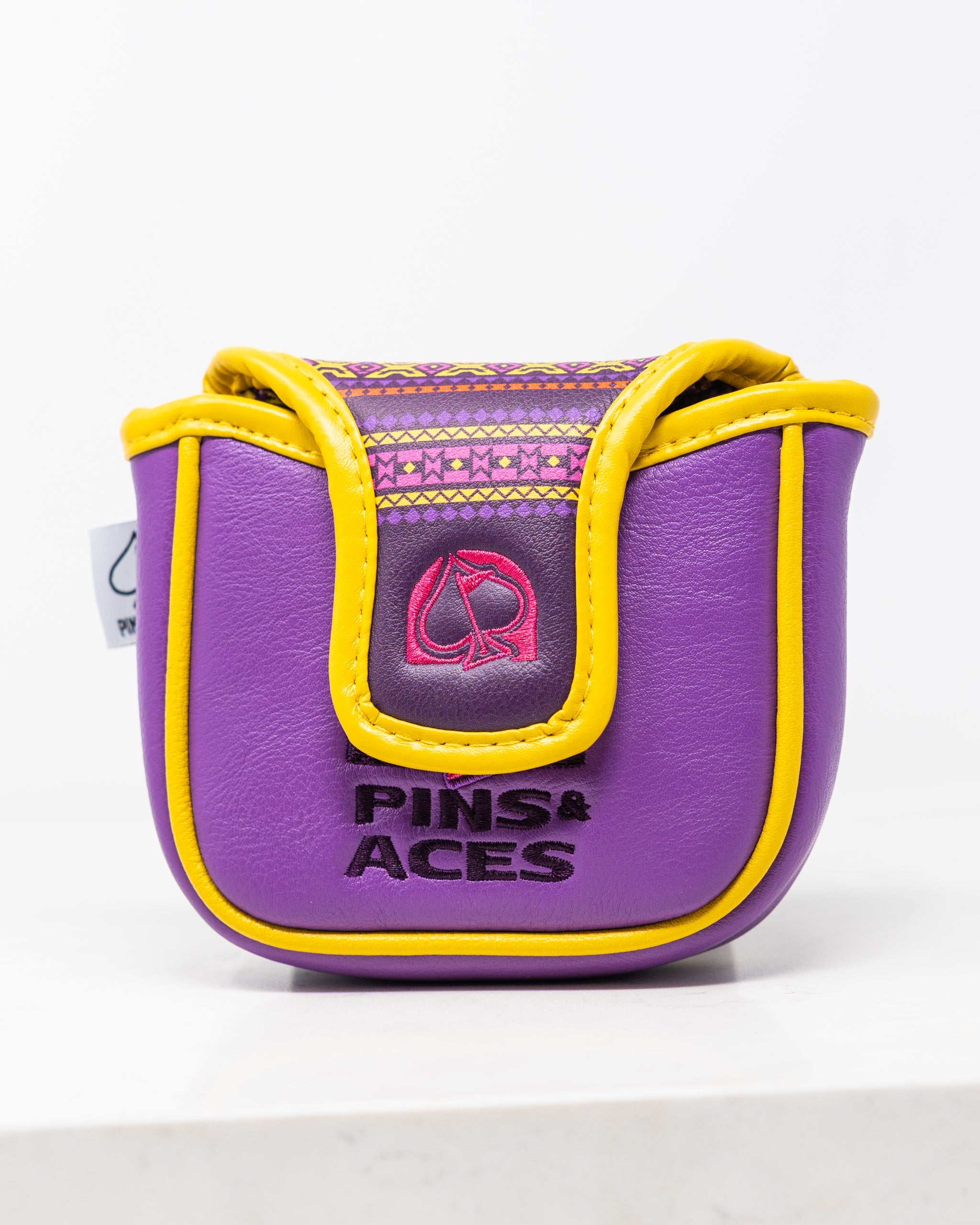 Alt text: "The Bogey Supreme mallet cover featuring a sleek design with vibrant colors and a durable material, designed to protect golf putters."