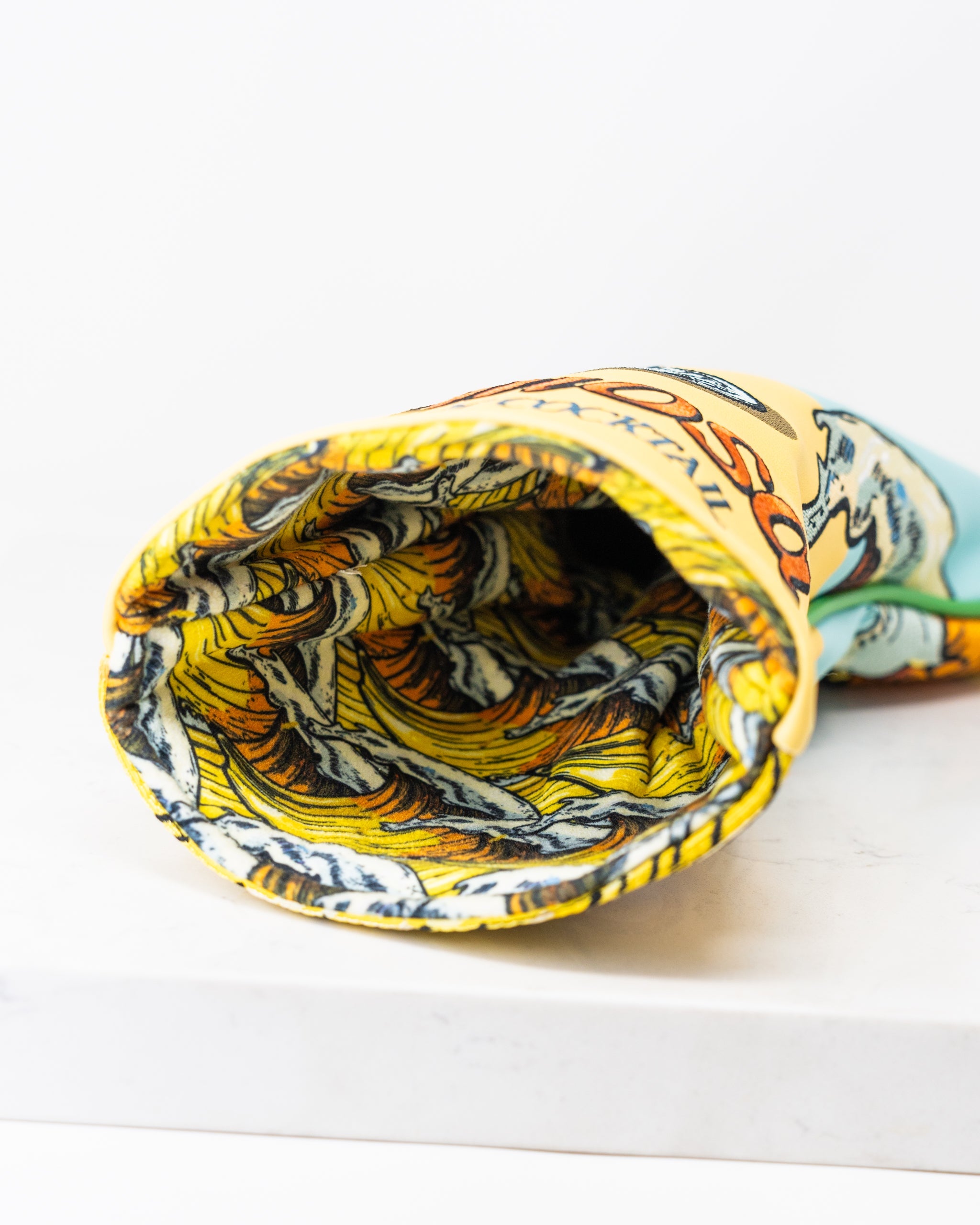 Mimosa Driver Cover featuring a colorful design with vibrant patterns and a soft fabric finish, ideal for golf clubs.