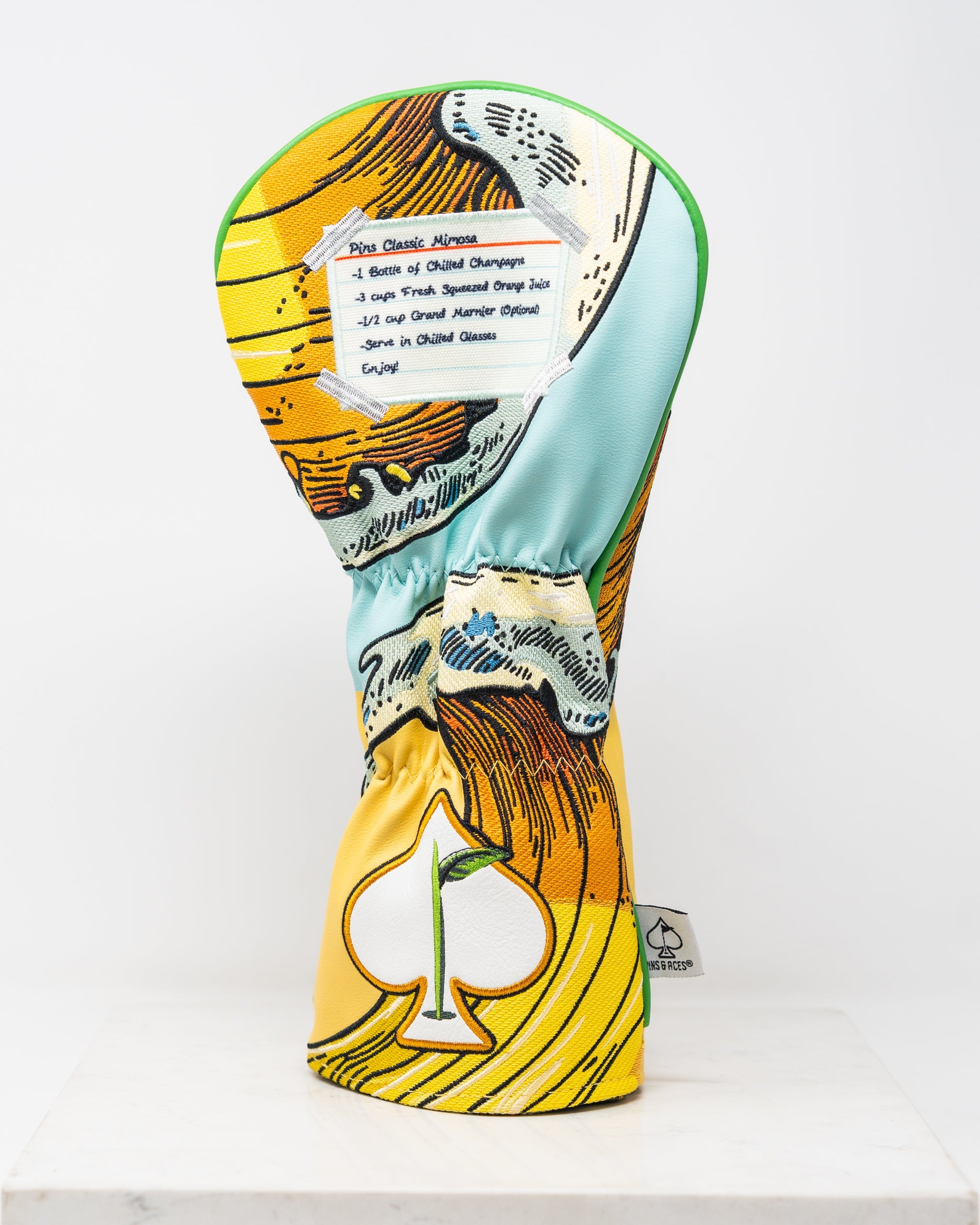 Mimosa driver cover with a vibrant floral design.