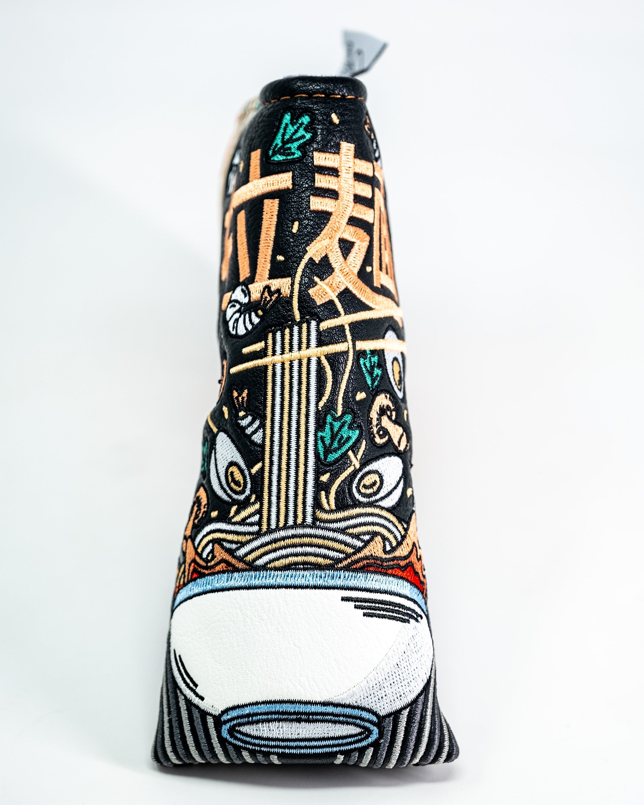Colorful embroidered ramen bowl design on a blade putter cover, protecting golf clubs with vibrant, detailed artwork.