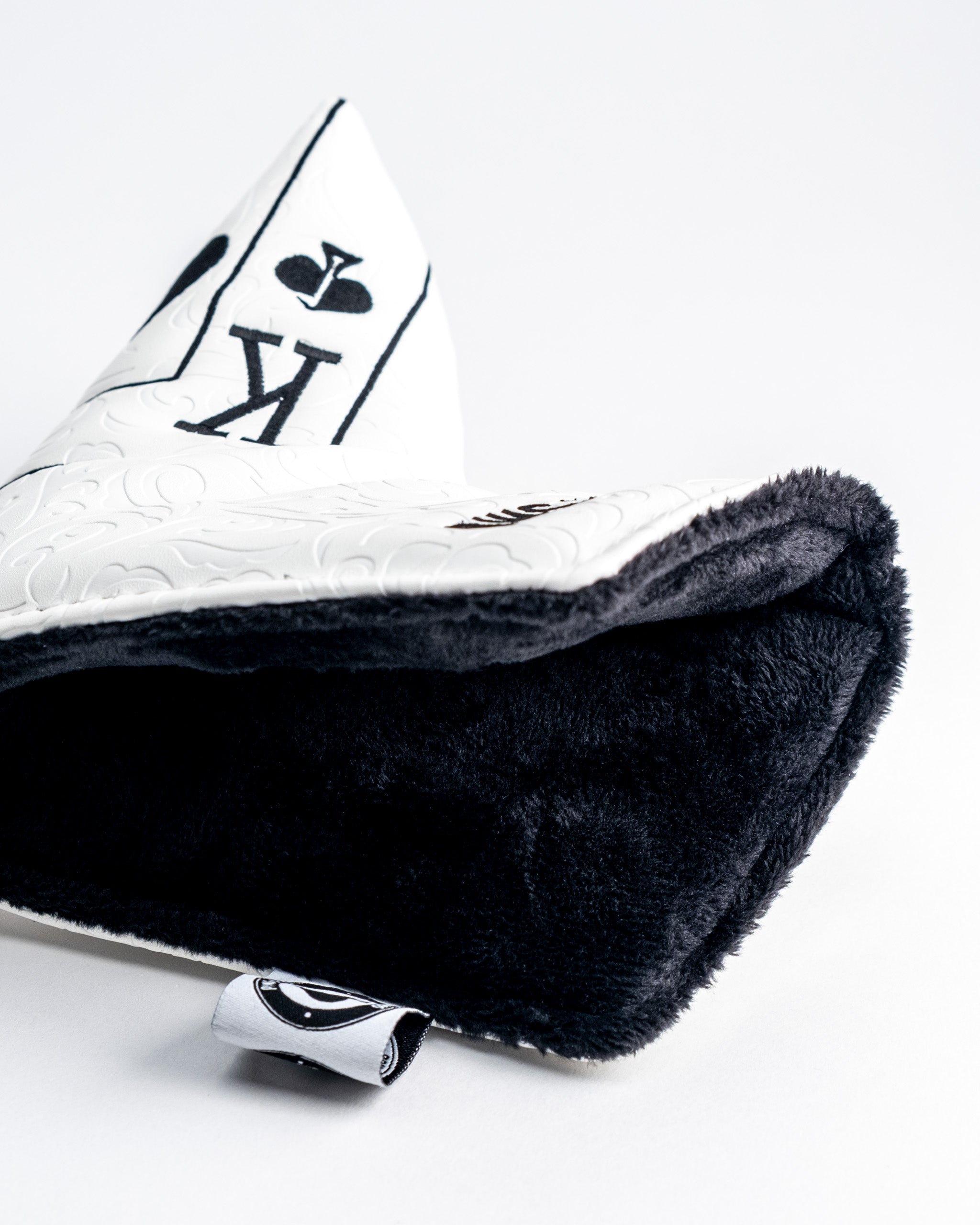 White Out Ace of Spades Blade Putter Cover featuring a sleek design and spade emblem.