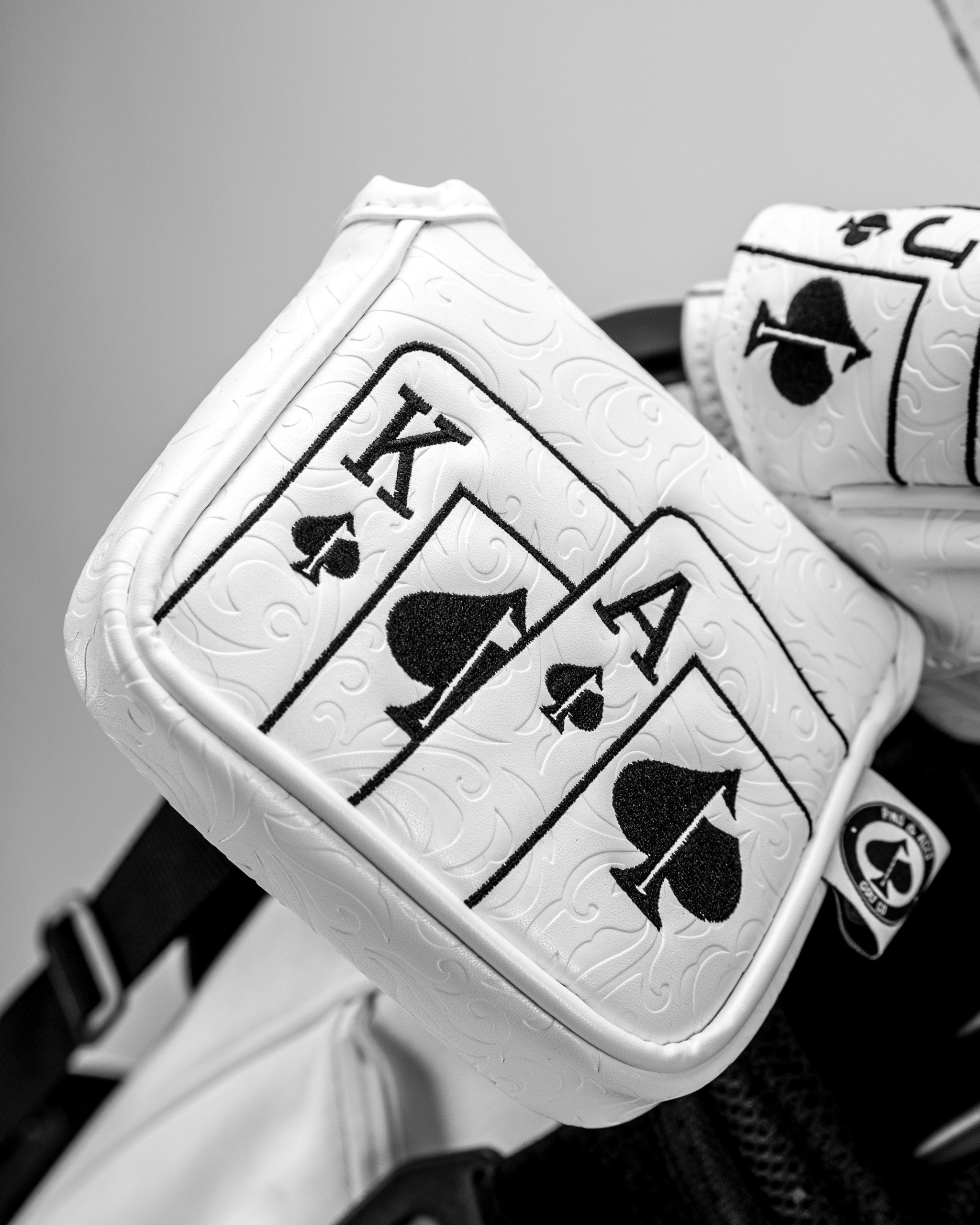 White Out Ace of Spades mallet putter cover featuring a sleek design and durable material, ideal for protecting golf clubs.