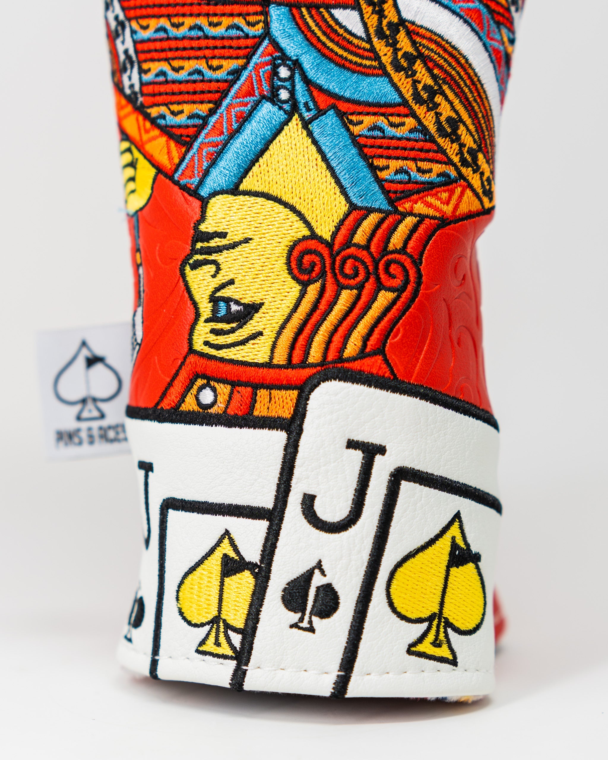 Orange Crush - Jack of Spades Hybrid Cover featuring a vibrant orange and black design with playing card motifs.