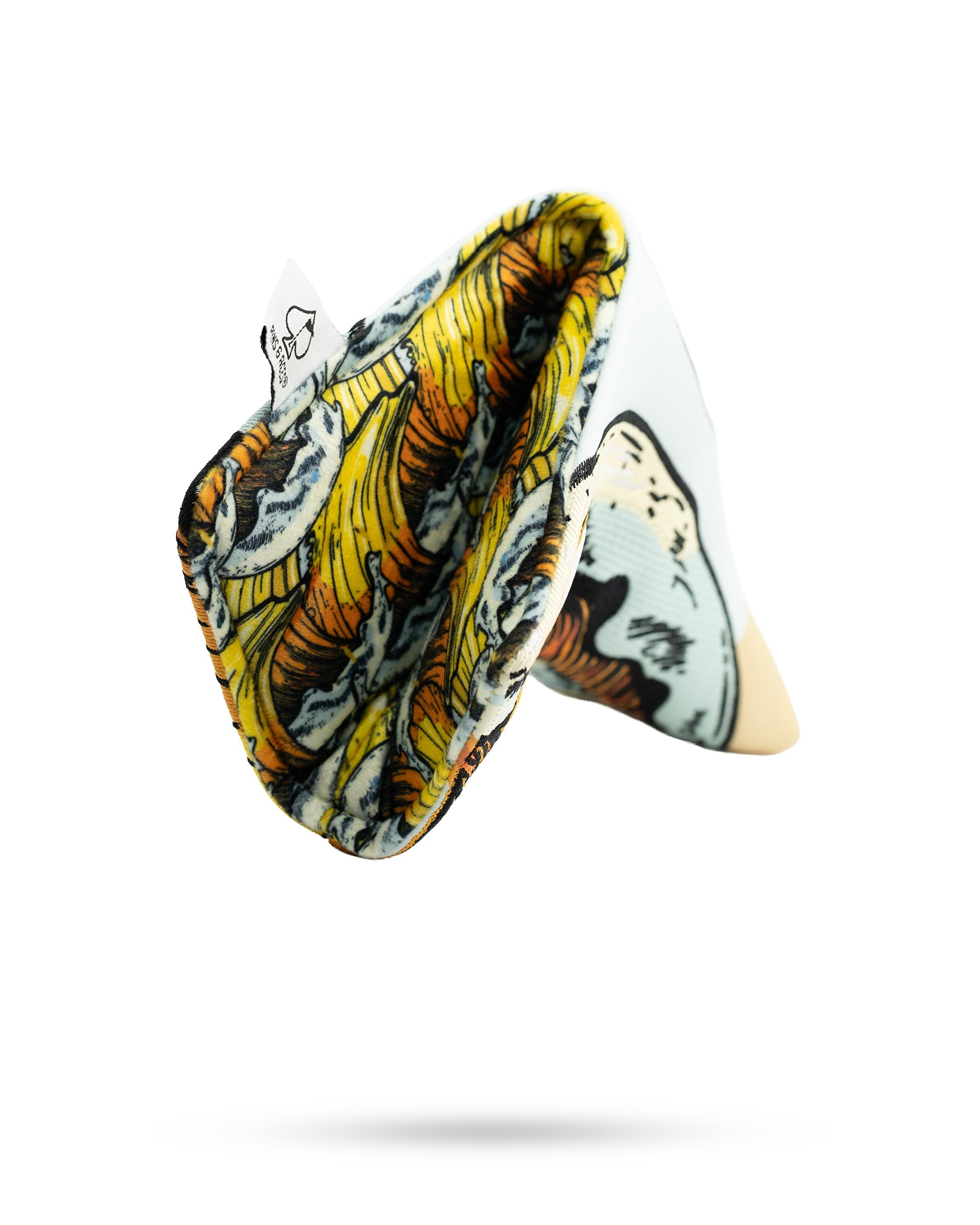 Bold blade putter cover featuring a unique design with vibrant colors and a soft interior for protection.