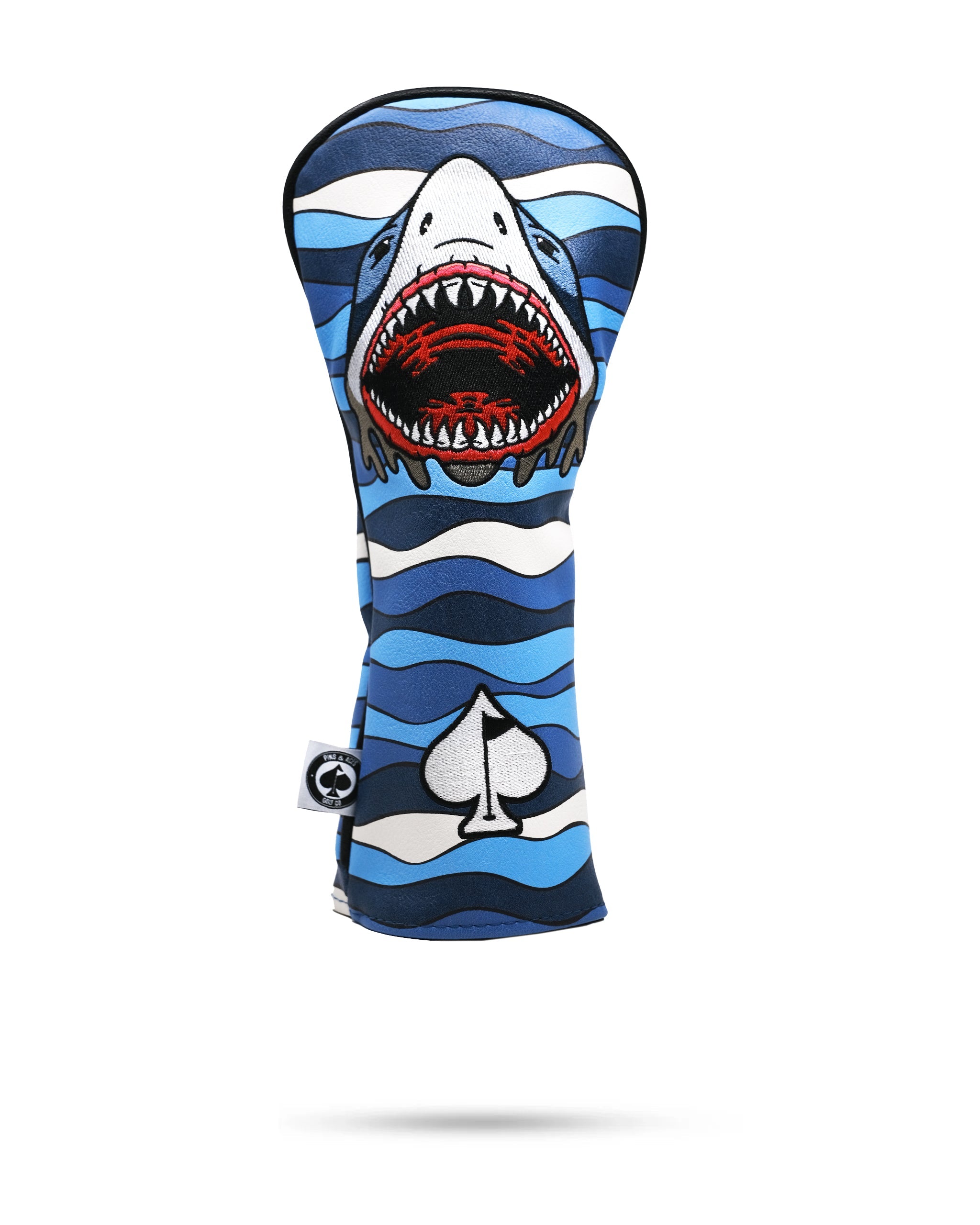 Bold golf headcover featuring a fierce shark design with blue waves, red mouth, and a spade symbol for standout style.