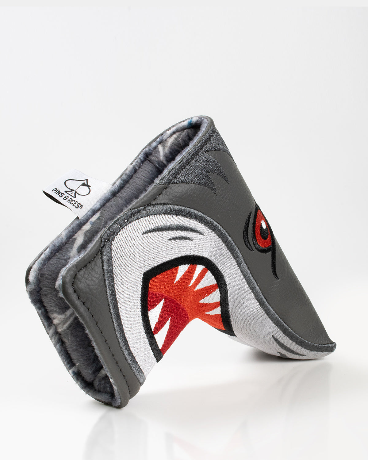 Hammerhead blade putter cover featuring a shark design, vibrant colors, and durable material, ideal for golf enthusiasts.