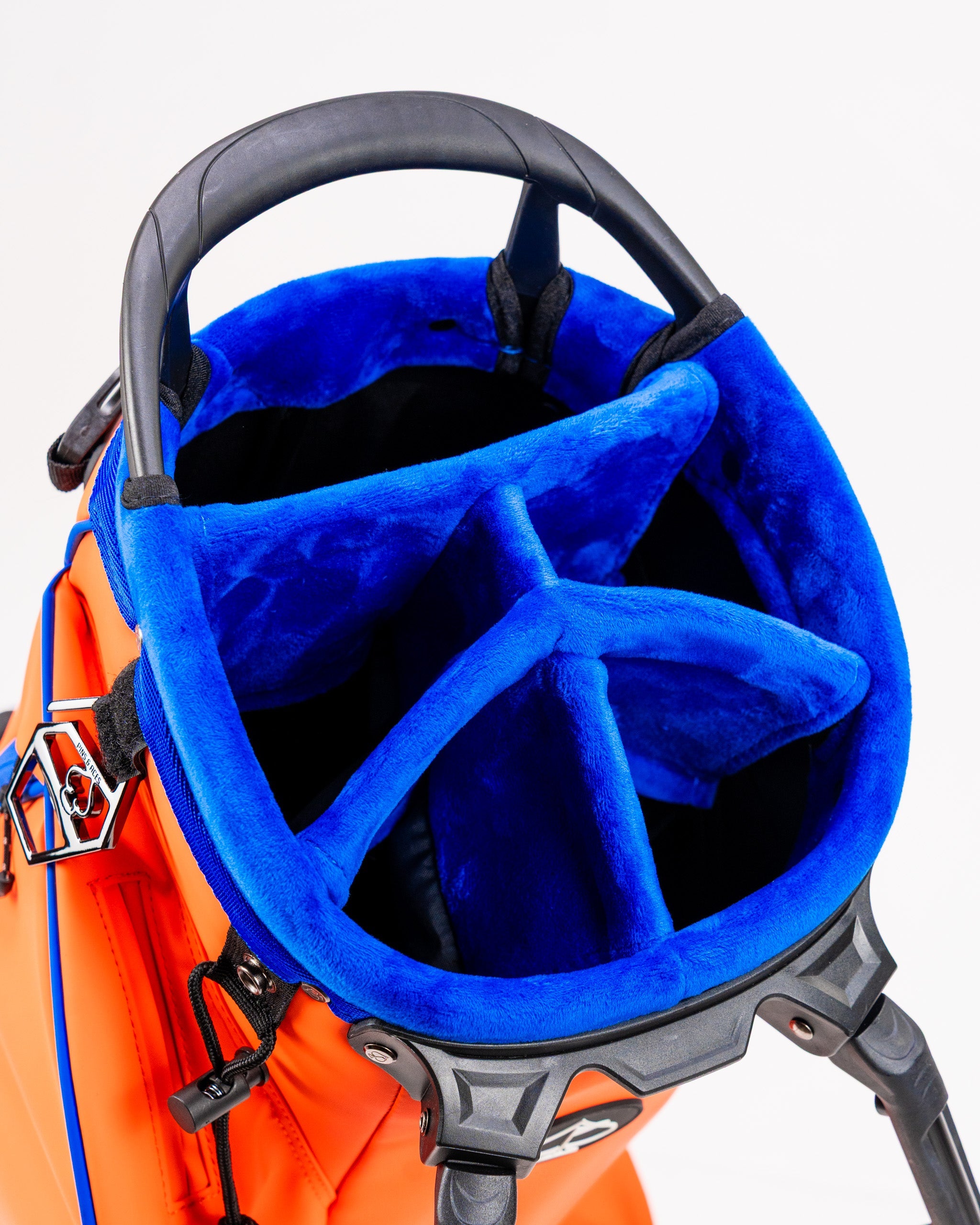 Player Preferred™ Golf Bag in Orange Crush color, featuring multiple pockets and a stylish design for golfers.
