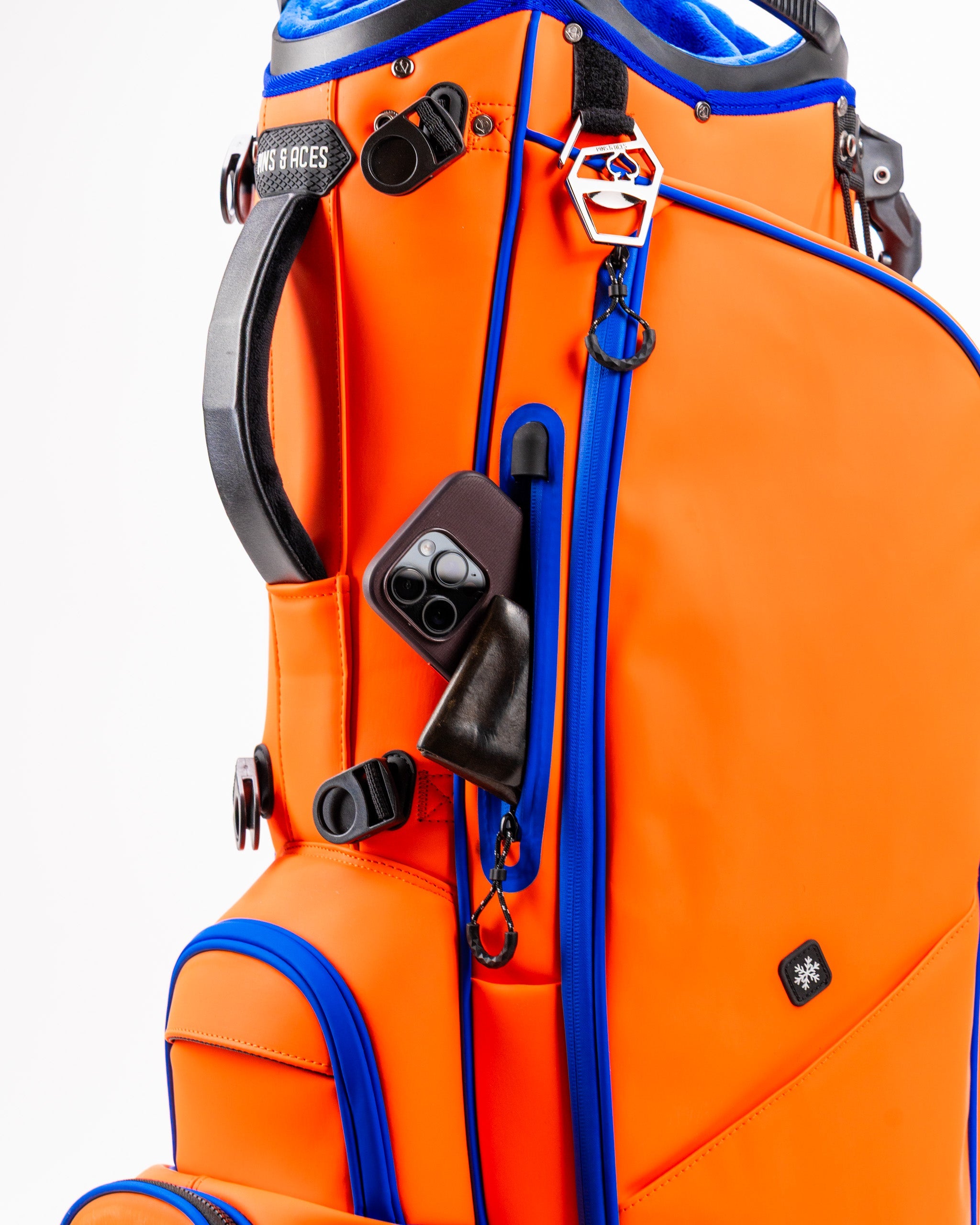 Player Preferred™ Golf Bag in Orange Crush, showcasing a vibrant orange color with multiple compartments and ergonomic straps.