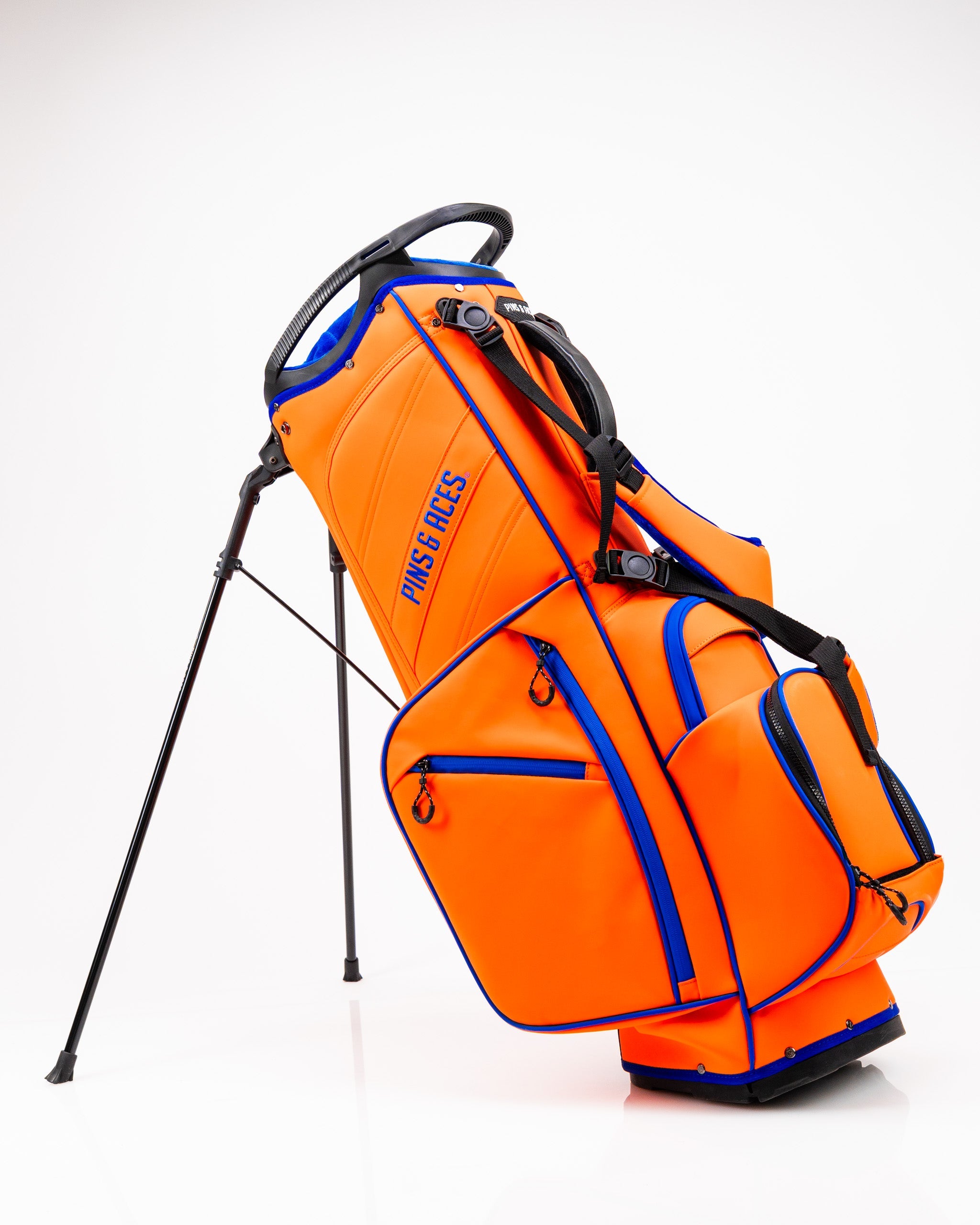 Player Preferred™ Golf Bag in Orange Crush featuring a sleek design and multiple pockets for storage.