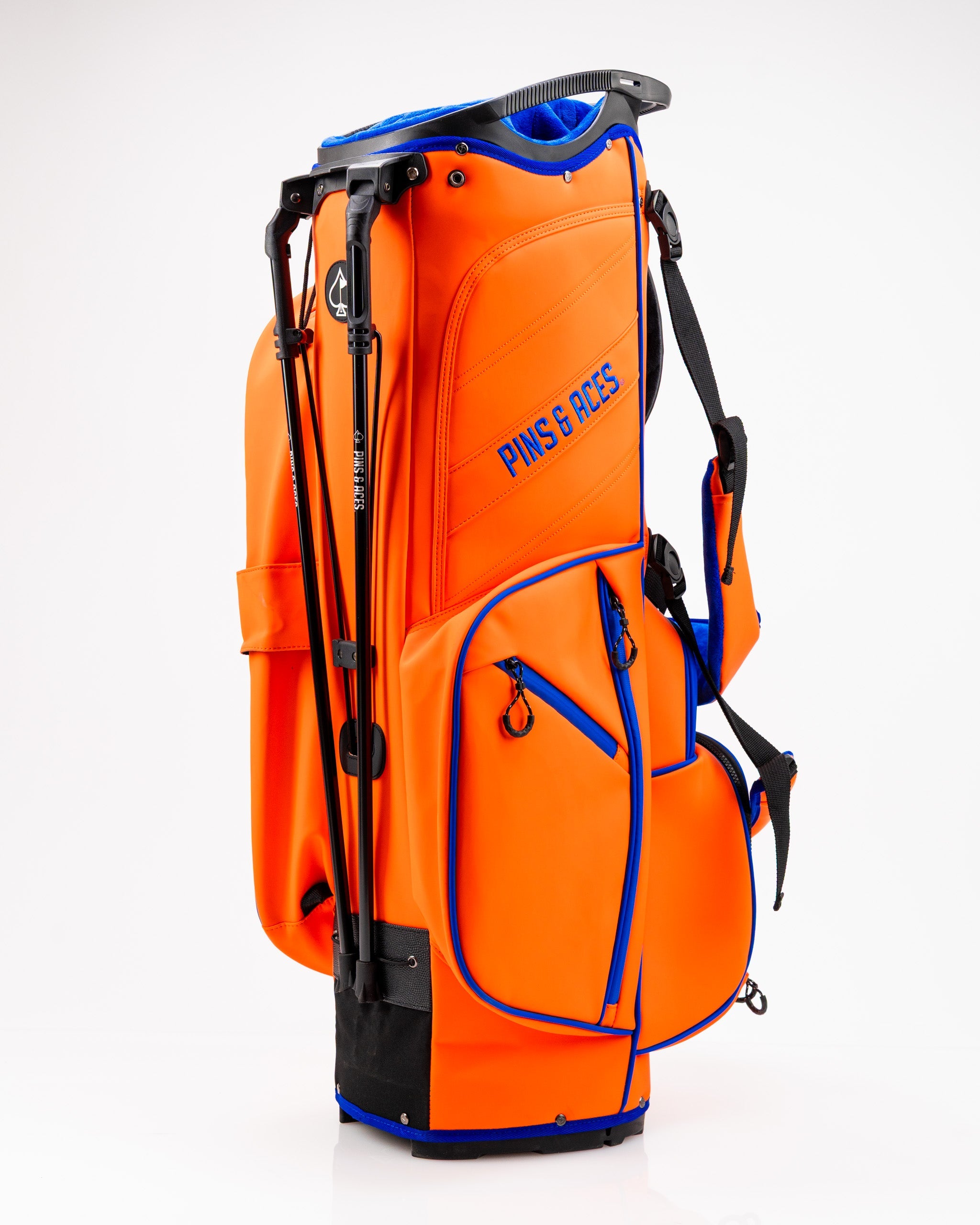 Player Preferred™ Golf Bag in vibrant Orange Crush color, featuring multiple pockets and a comfortable carry strap.