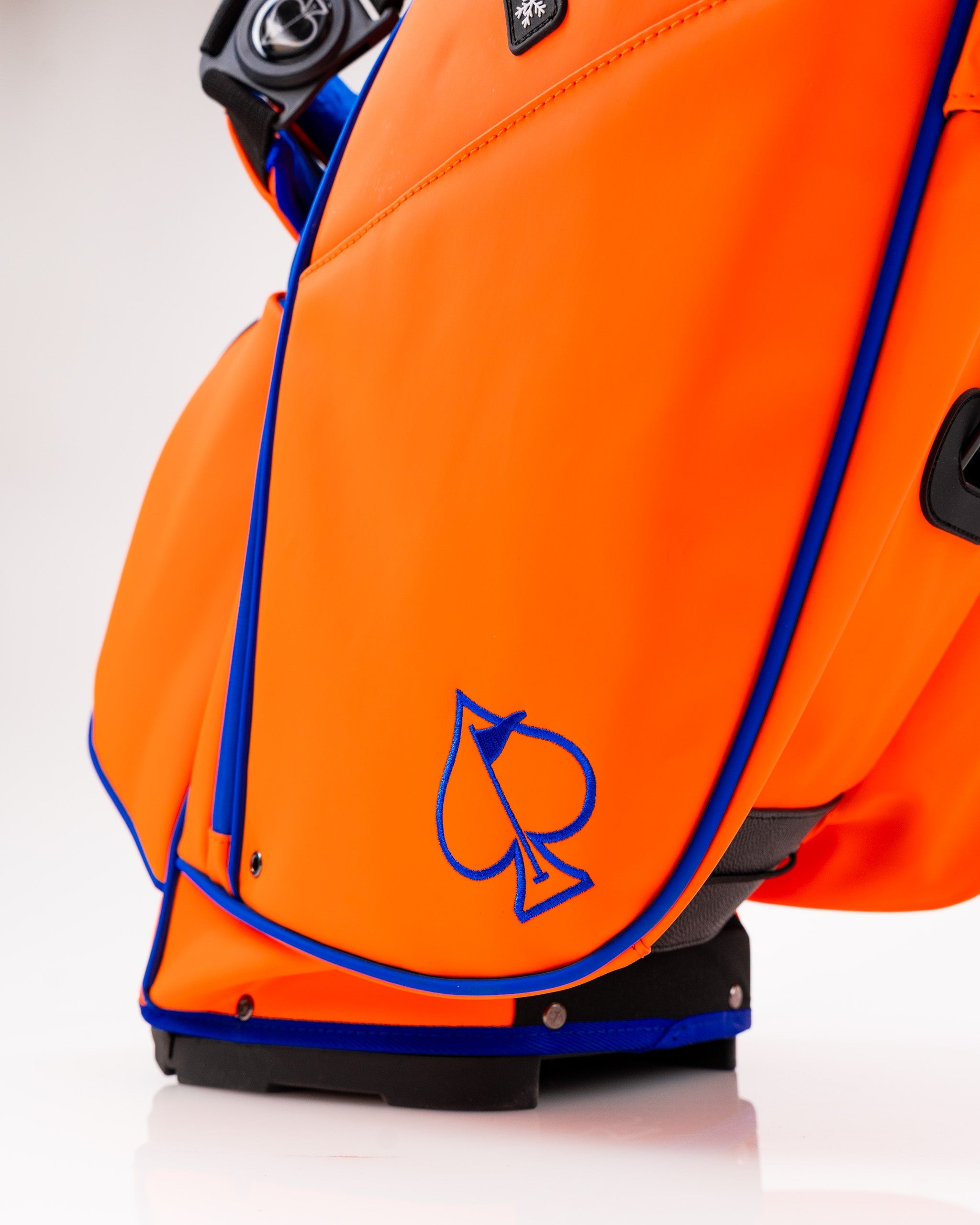 "Orange Crush Player Preferred™ Golf Bag with multiple pockets and a comfortable shoulder strap."