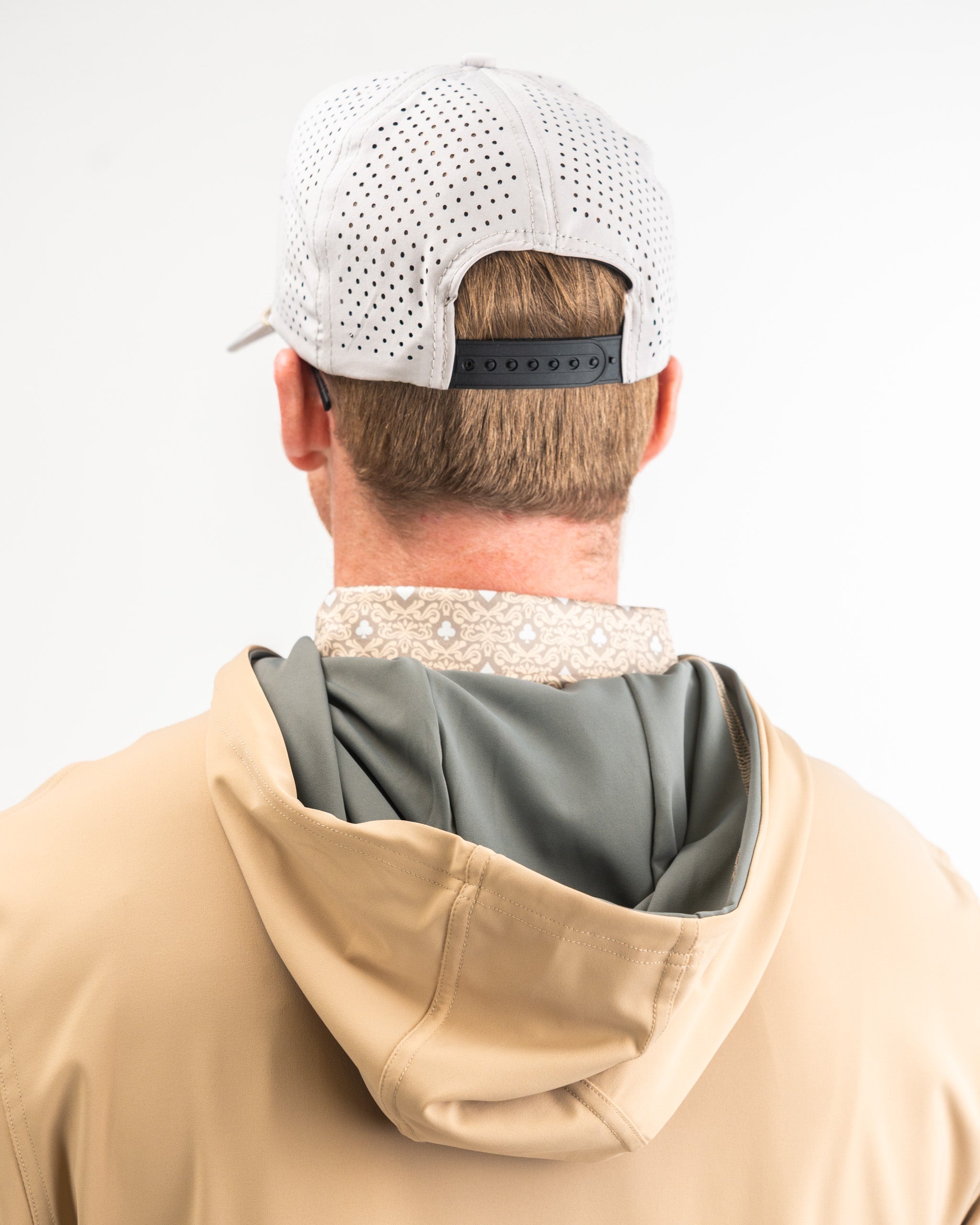 Performance Golf Hoodie in Big Blind Sand with a sleek design and modern fit, featuring a hood and front pocket.