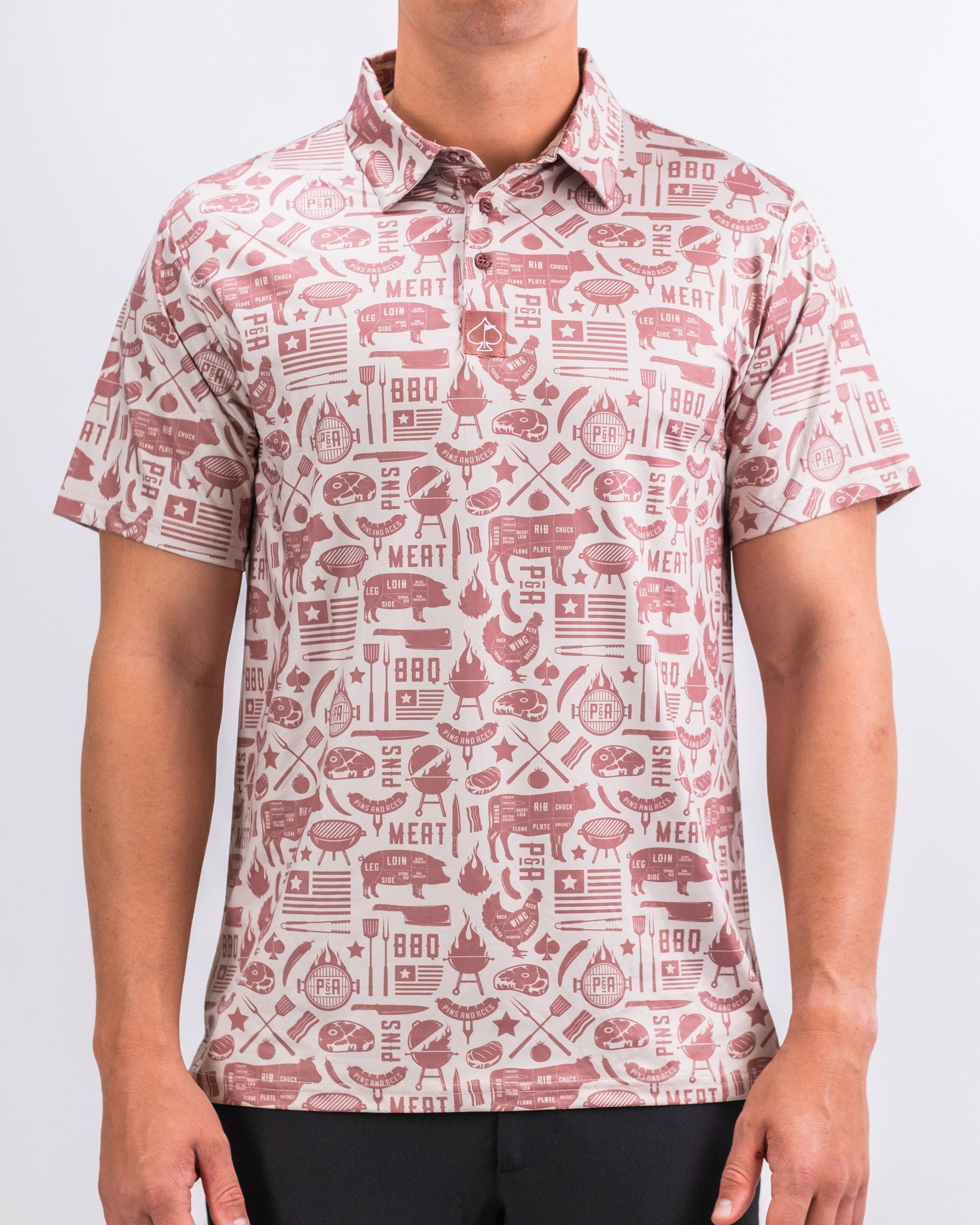 Men's Pitmaster shirt in olive green, featuring a button-up design and chest pocket, displayed on a wooden background.