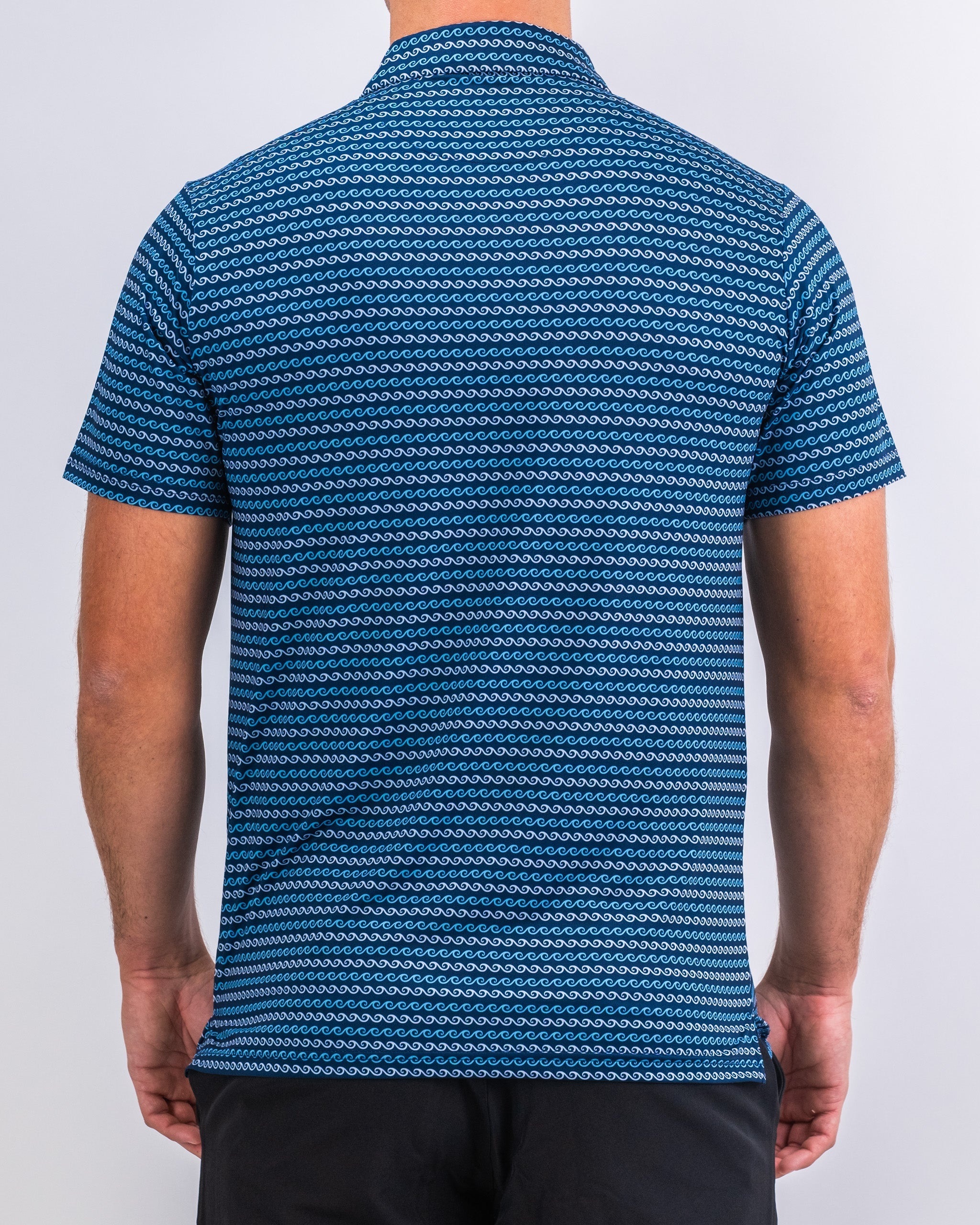 Men's Rising Tides graphic t-shirt in navy blue with a wave design.