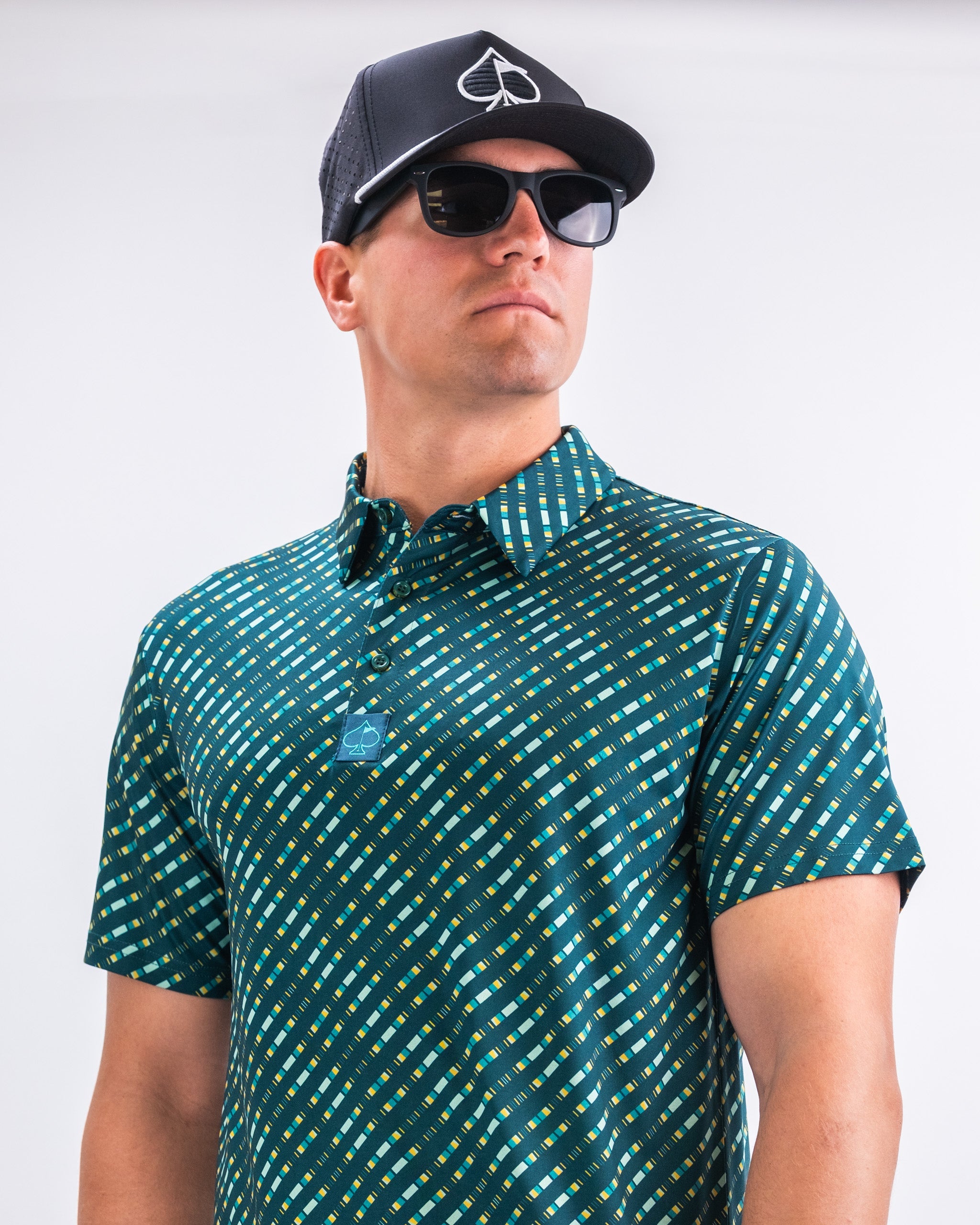 Men's Chromo Green jacket displayed on a wooden background.