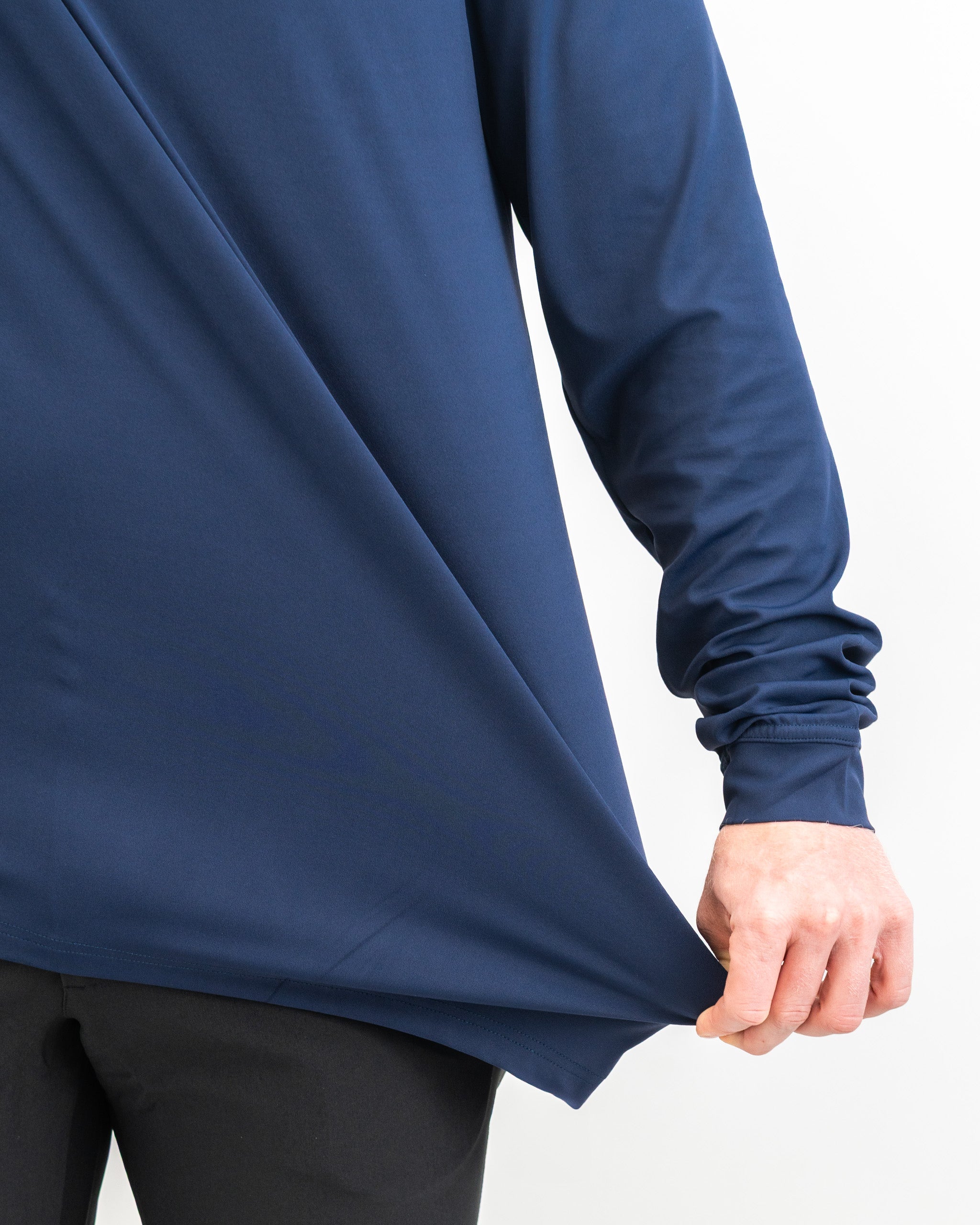 Performance golf hoodie in navy blue, designed for comfort and style during play.
