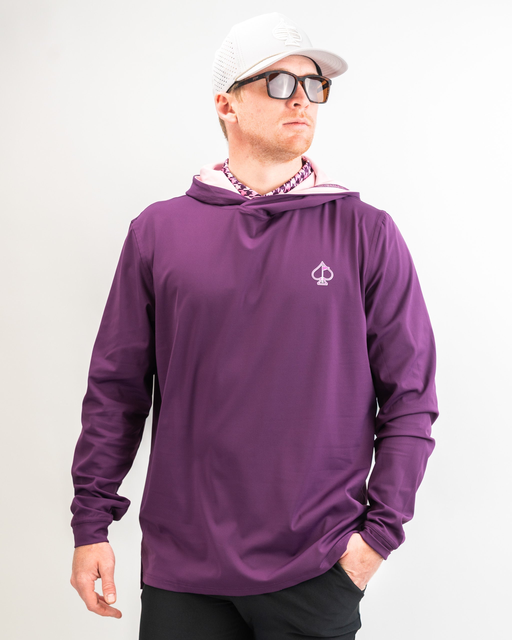 Performance Golf Hoodie in Houndstooth Raspberry pattern, featuring a comfortable fit and moisture-wicking fabric.