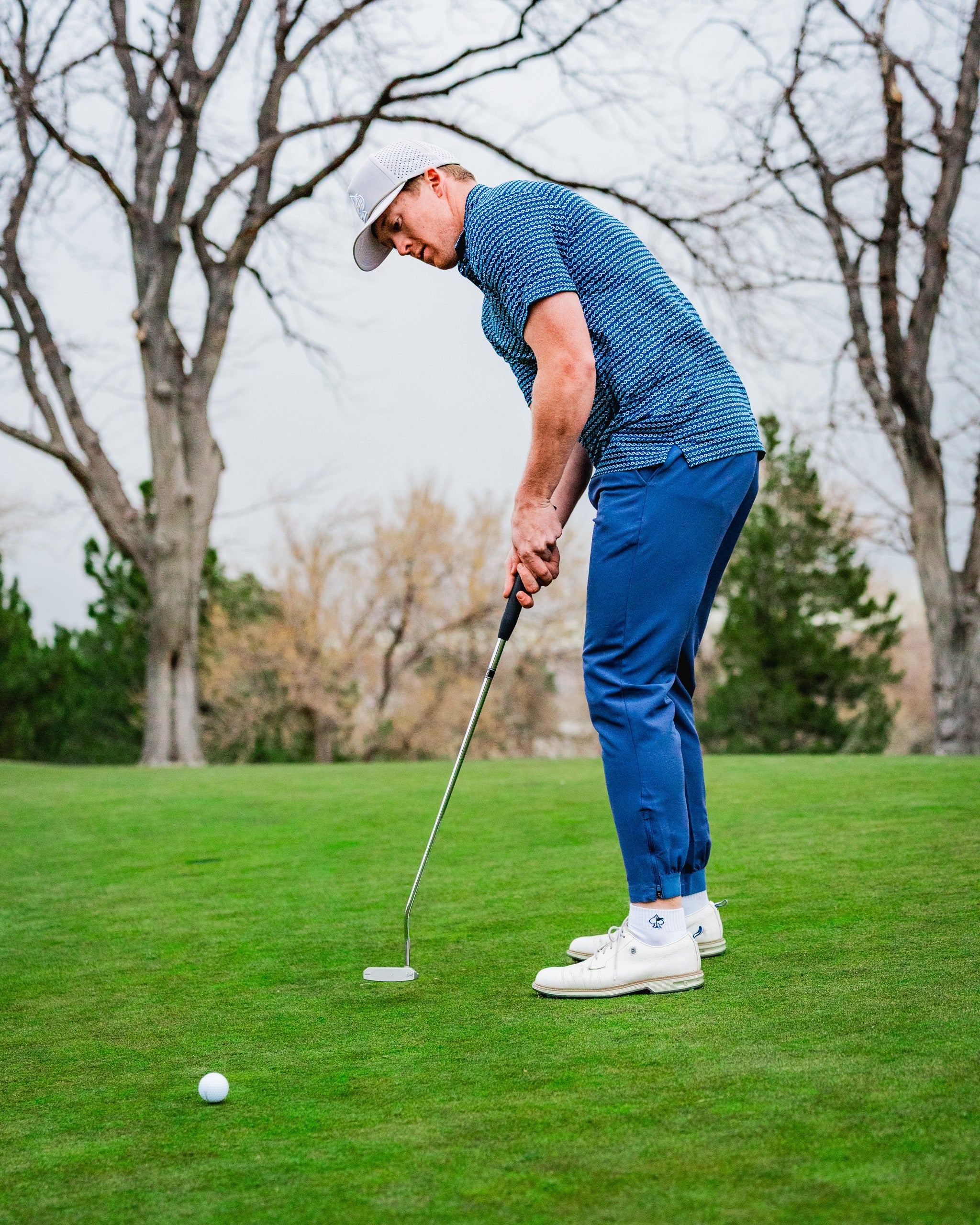 "Abstract artwork titled 'Rising Tides' depicting vibrant colors and fluid shapes reminiscent of waves and hills."