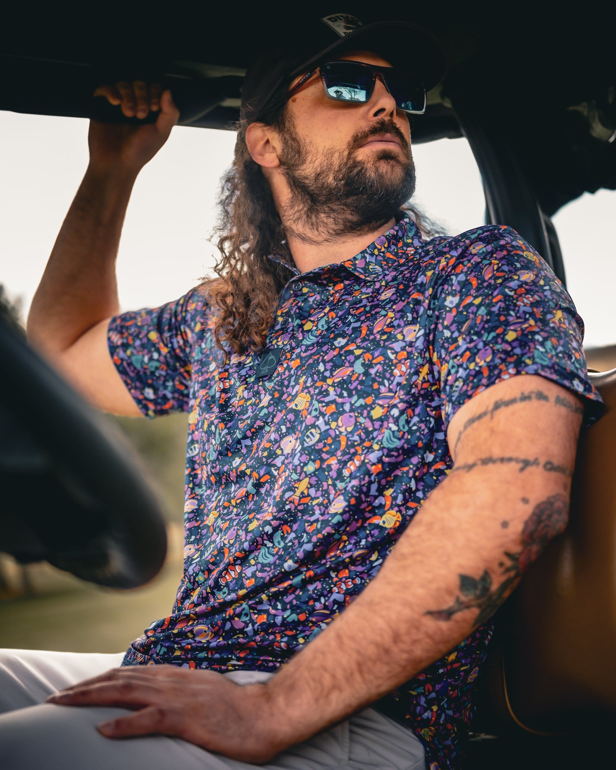 Tropical Shatter product in a vibrant lifestyle setting, showcasing its amber glass-like texture and tropical packaging.