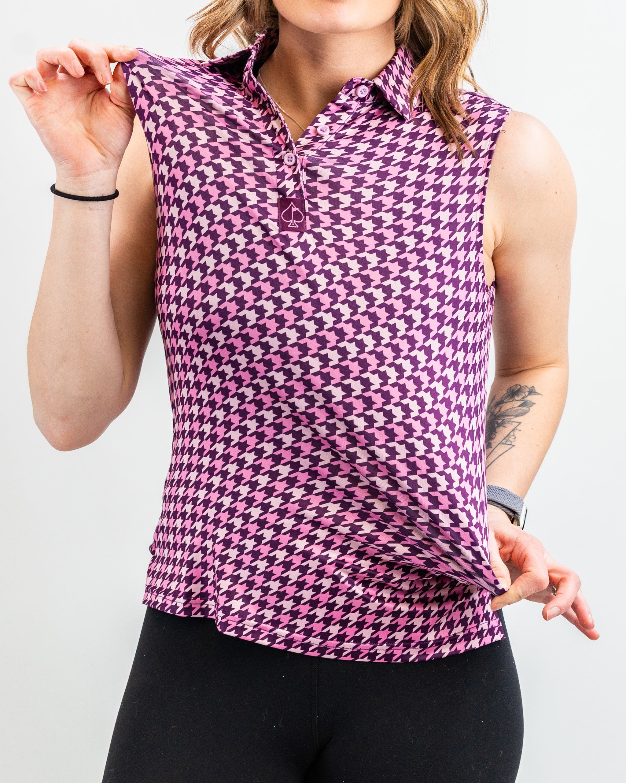 Women's houndstooth pattern dress in raspberry color, showcasing a flattering fit and elegant design.