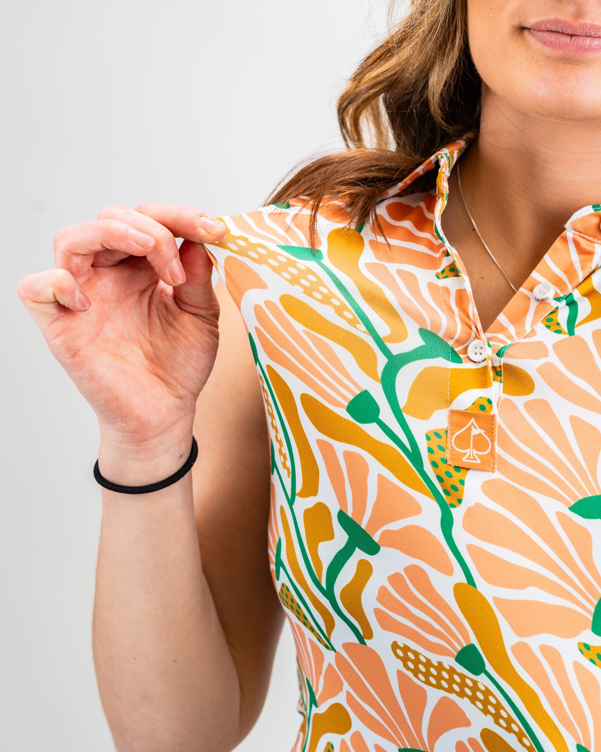 Women's Garden Party Spritz dress, featuring a colorful floral print on a light background, perfect for spring occasions.