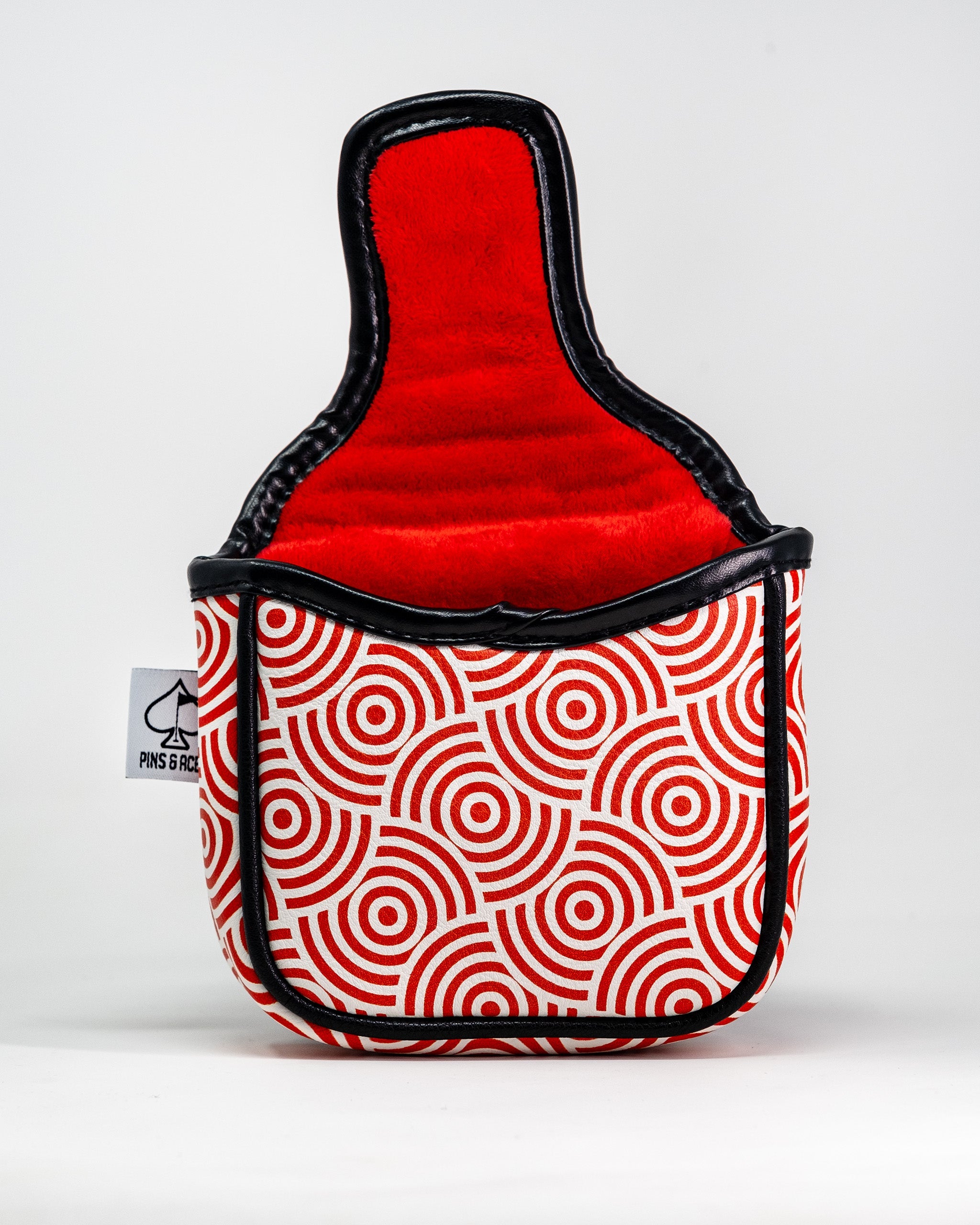 Red and white patterned mallet putter cover with black trim and a red interior, designed to protect golf putters.