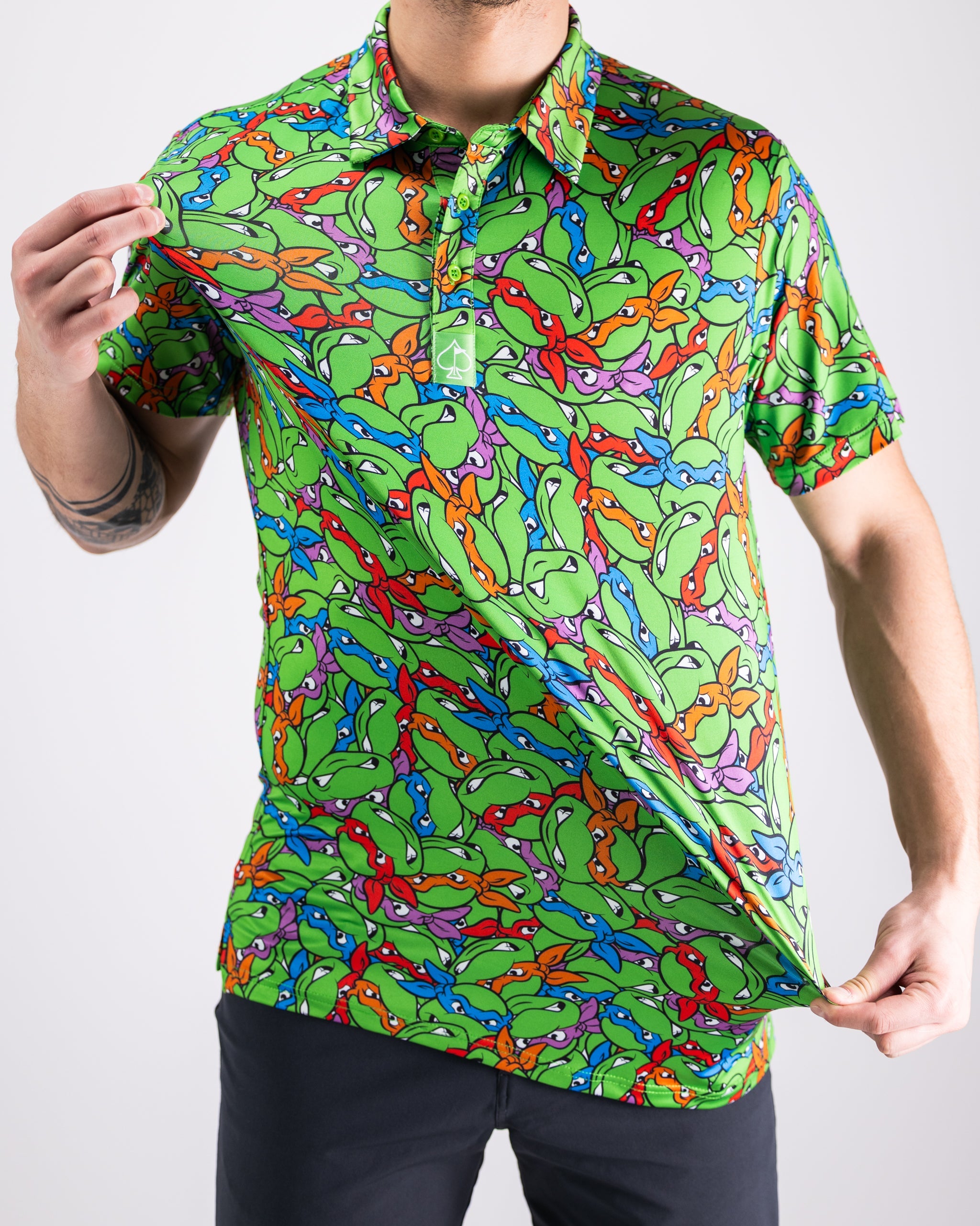 TMNT Mean Green polo shirt featuring vibrant Teenage Mutant Ninja Turtles graphics and a comfortable fit.