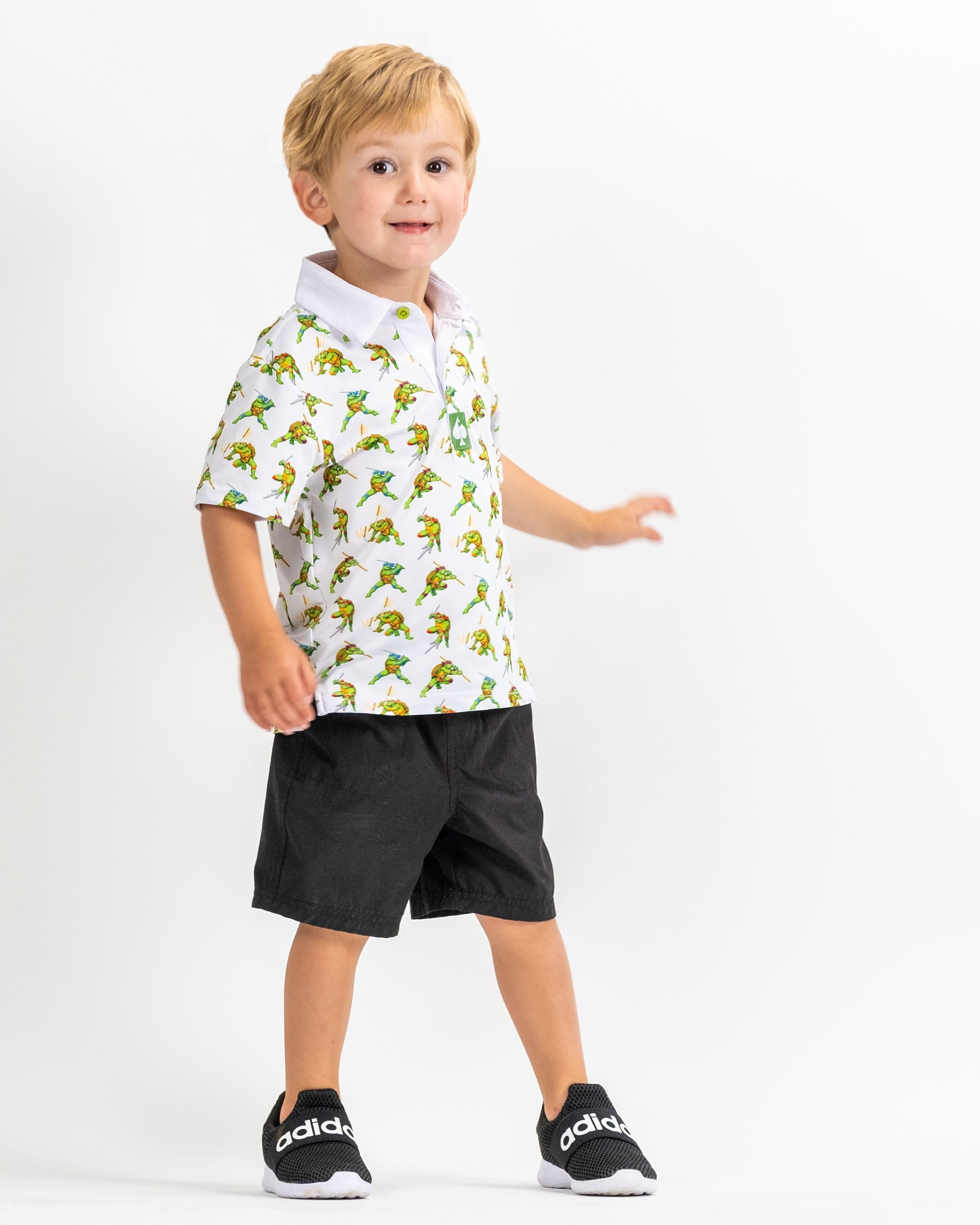 TMNT Youth Cowabunga Classic 8-Bit graphic t-shirt featuring iconic Teenage Mutant Ninja Turtles design.