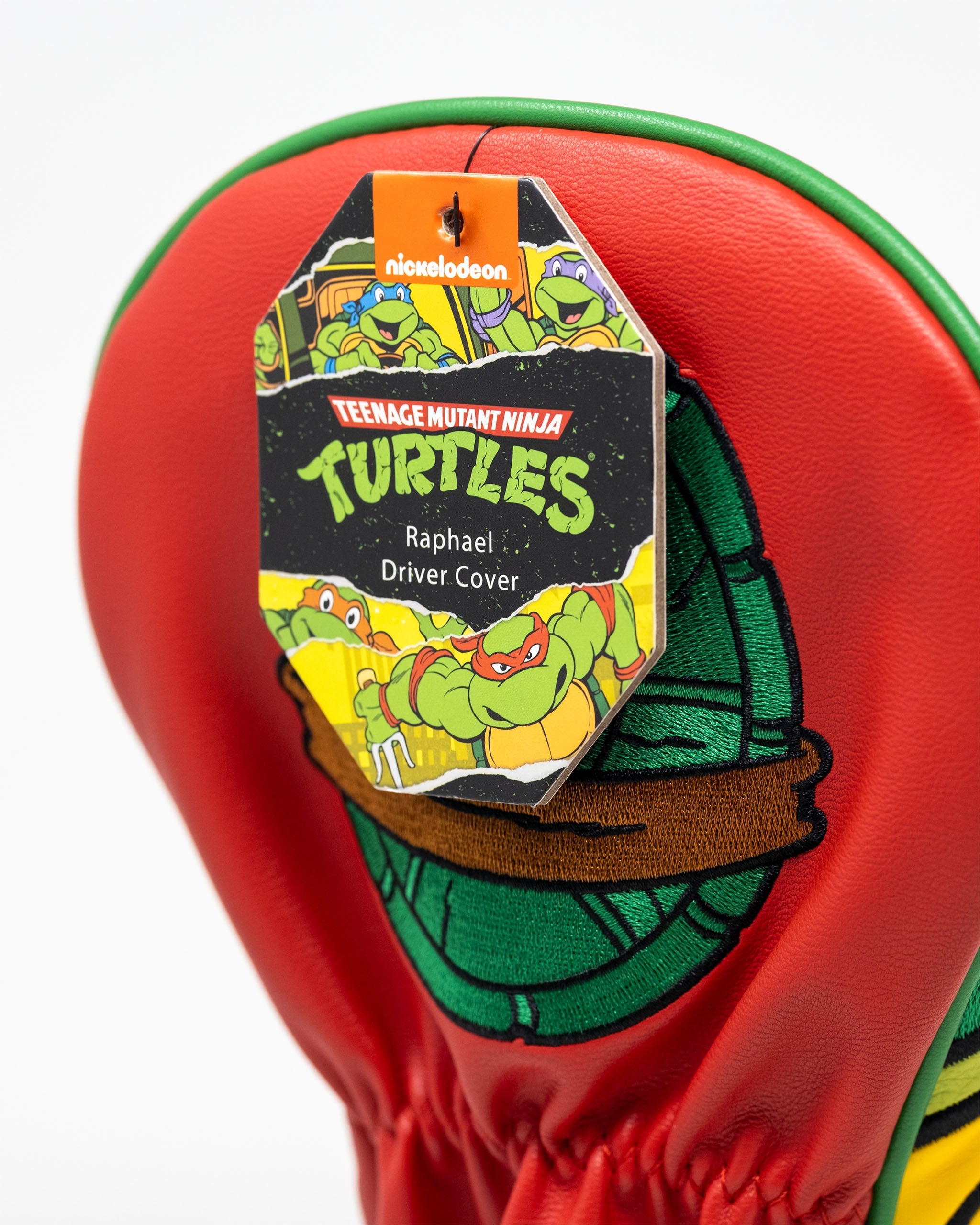 TMNT Raphael driver cover featuring vibrant colors and character design with a playful and protective style.