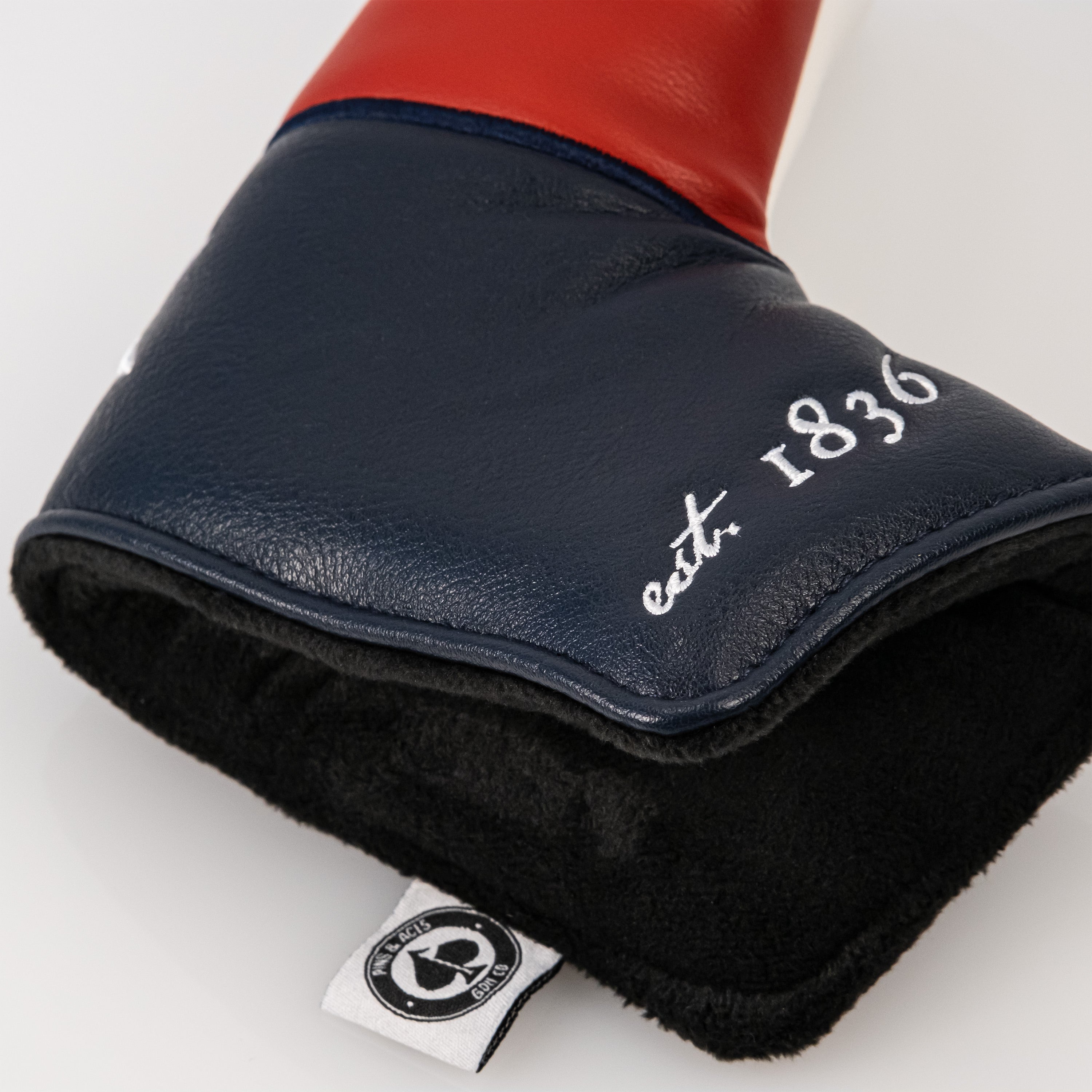 Texas Lone Star blade putter cover featuring a Texas flag design and padded interior for protection.