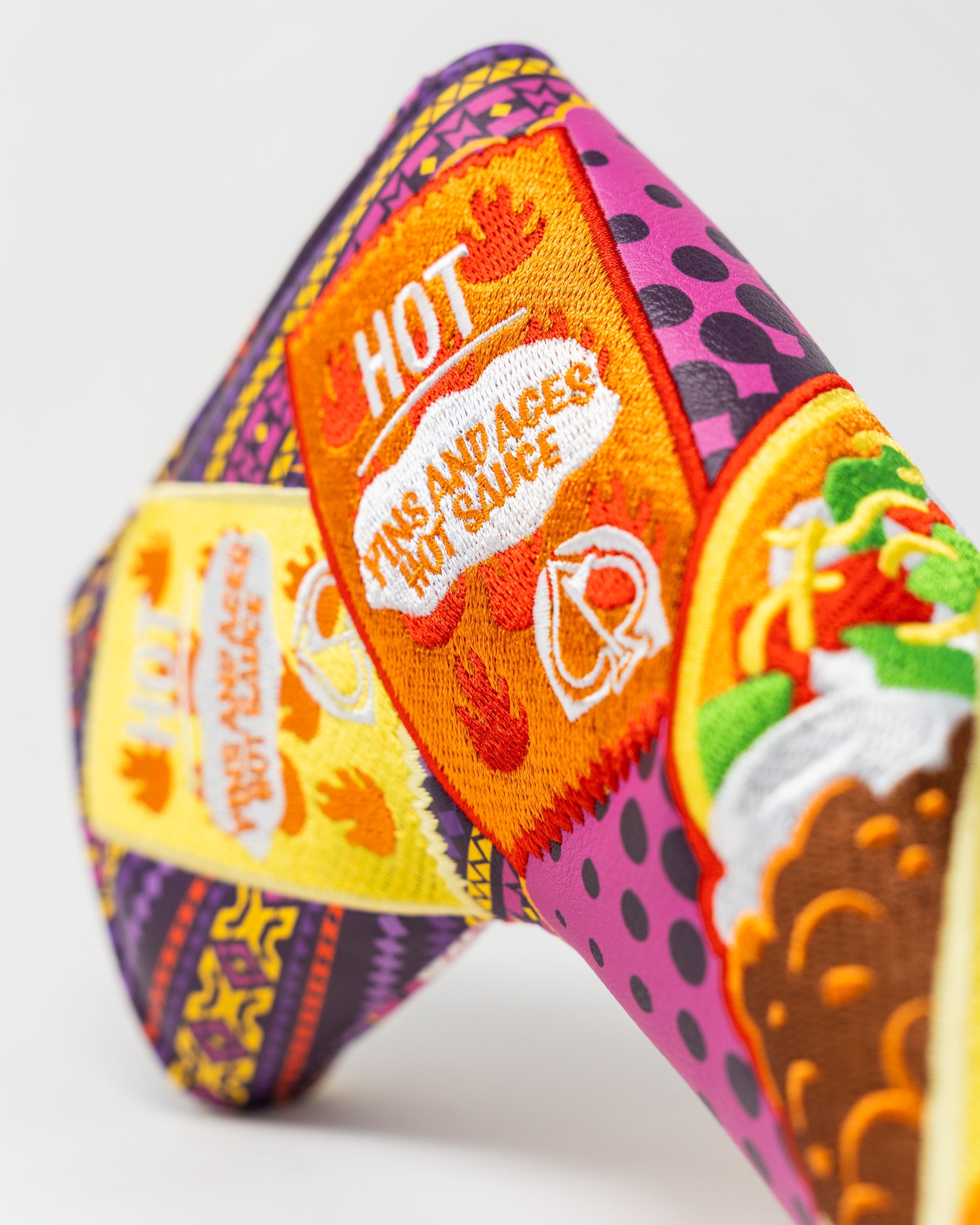 Alt text: "The Bogey Supreme blade putter cover featuring a sleek design with a textured finish and prominent logo, ideal for protecting golf putters."