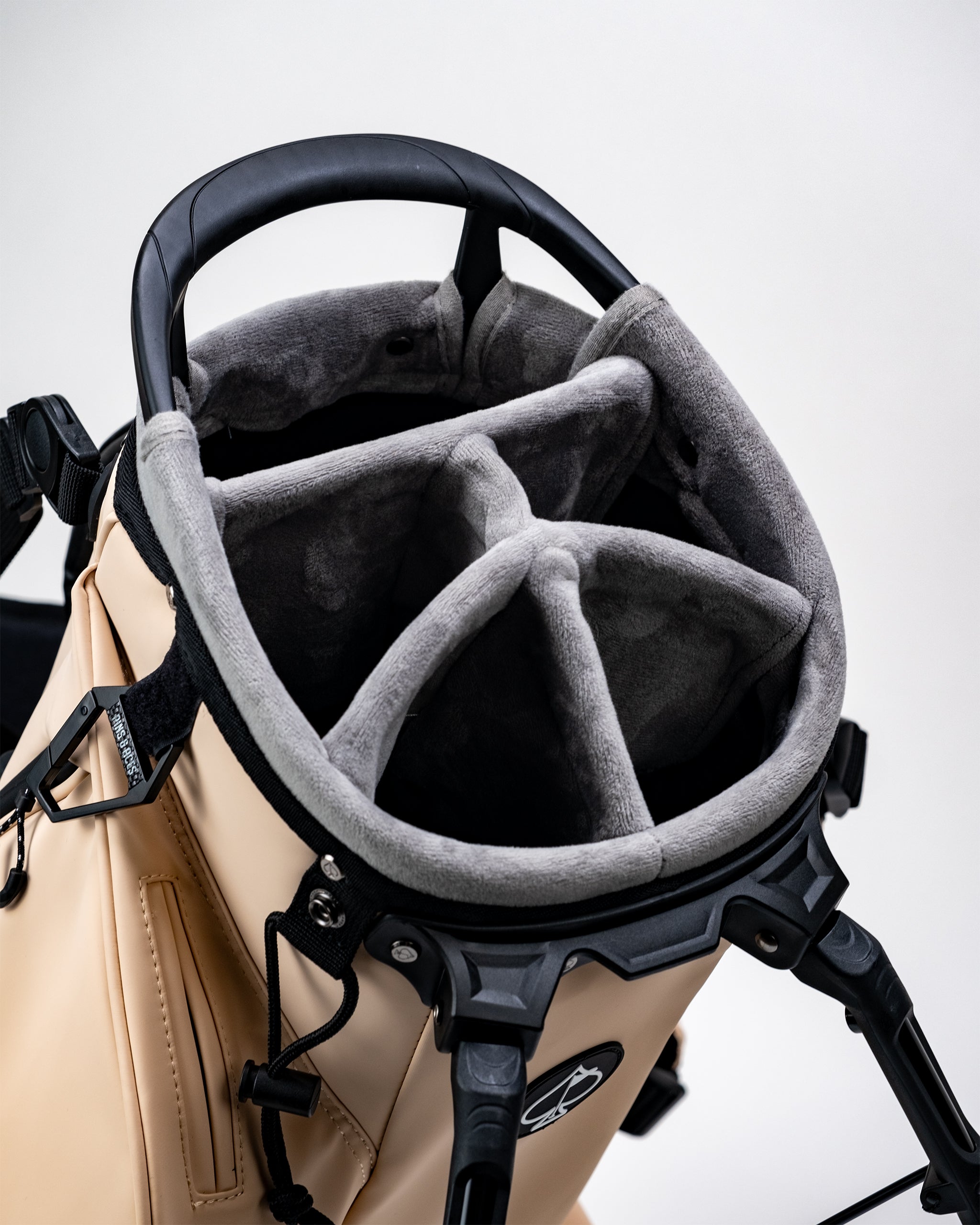 Golf cart with gray headcovers featuring black accents, designed for bold, unique golf style and course standout appeal.