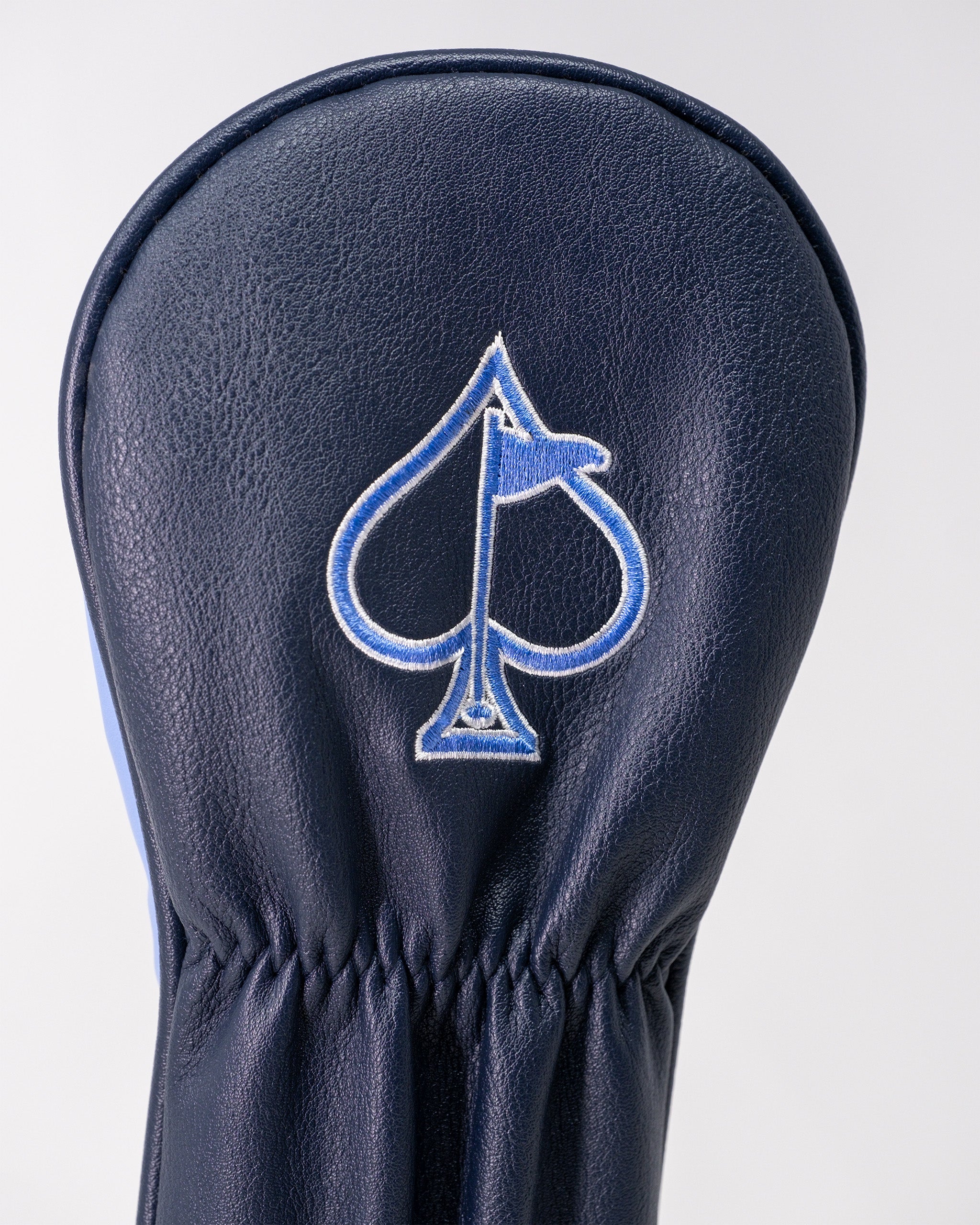 Top Gun Ice Man Fairway Headcover with embroidered spade logo in blue and white, made of navy leather for golf clubs.