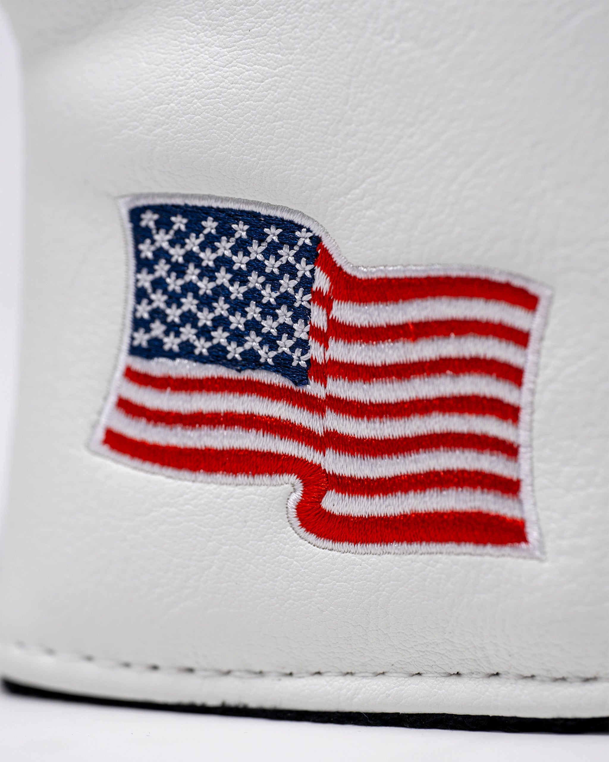 Trump Blade Putter Cover featuring a detailed design with a presidential theme, designed for standard blade putters.