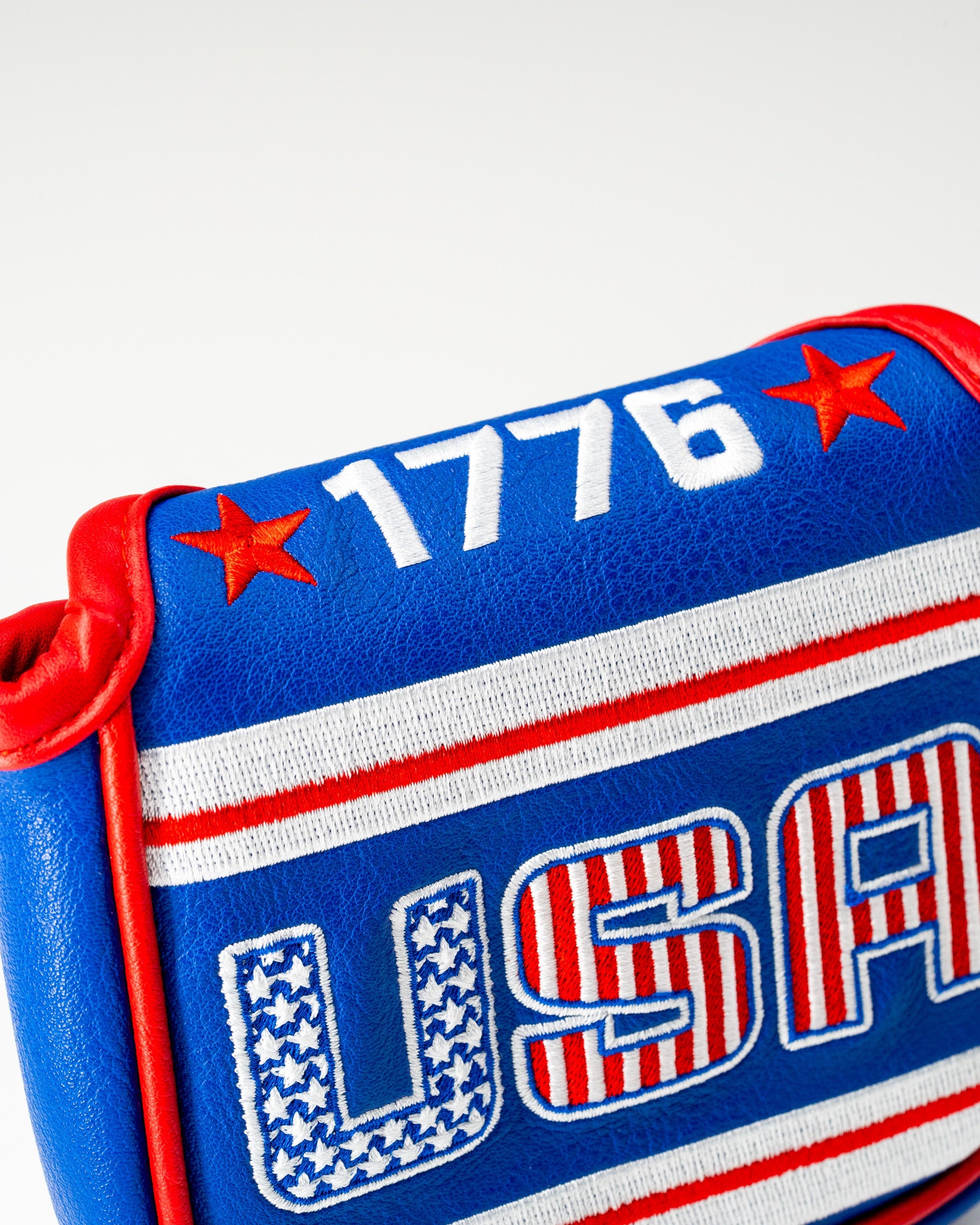 USA Tribute 2.0 center shaft mallet putter cover featuring red, white, and blue design with stars and "1776" text.