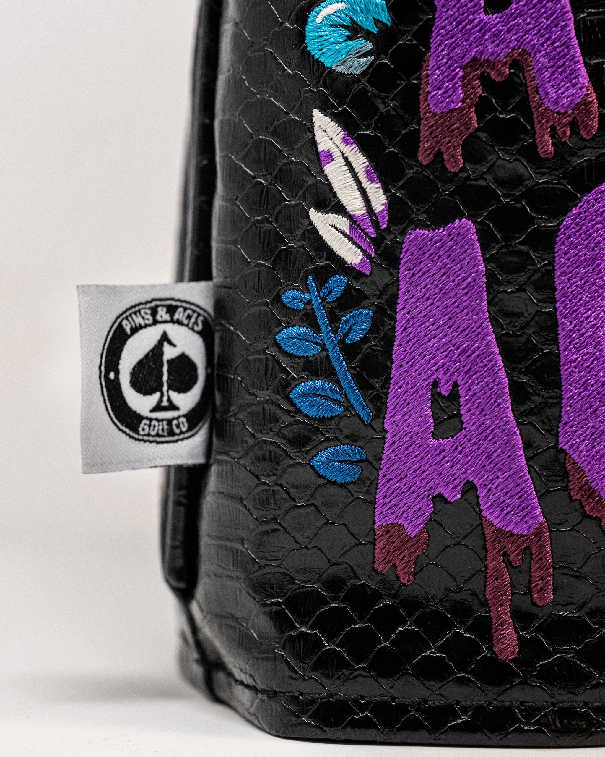 Venom Fairway Cover featuring a sleek black and green design with venomous snake graphics. Ideal for golf club protection.