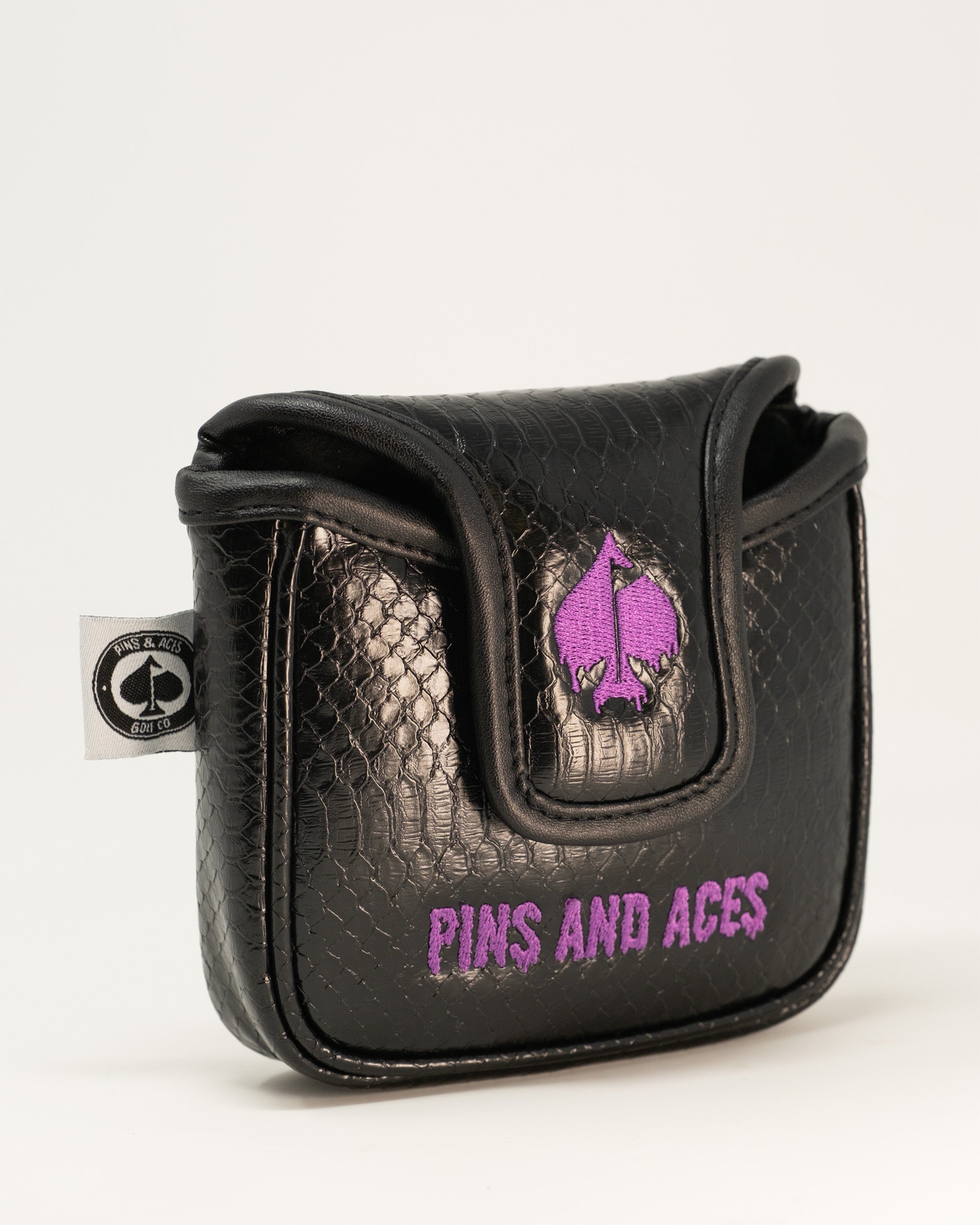 Alt text: Venom mallet cover featuring a black and green design with Venom character graphics, suitable for protecting golf clubs.