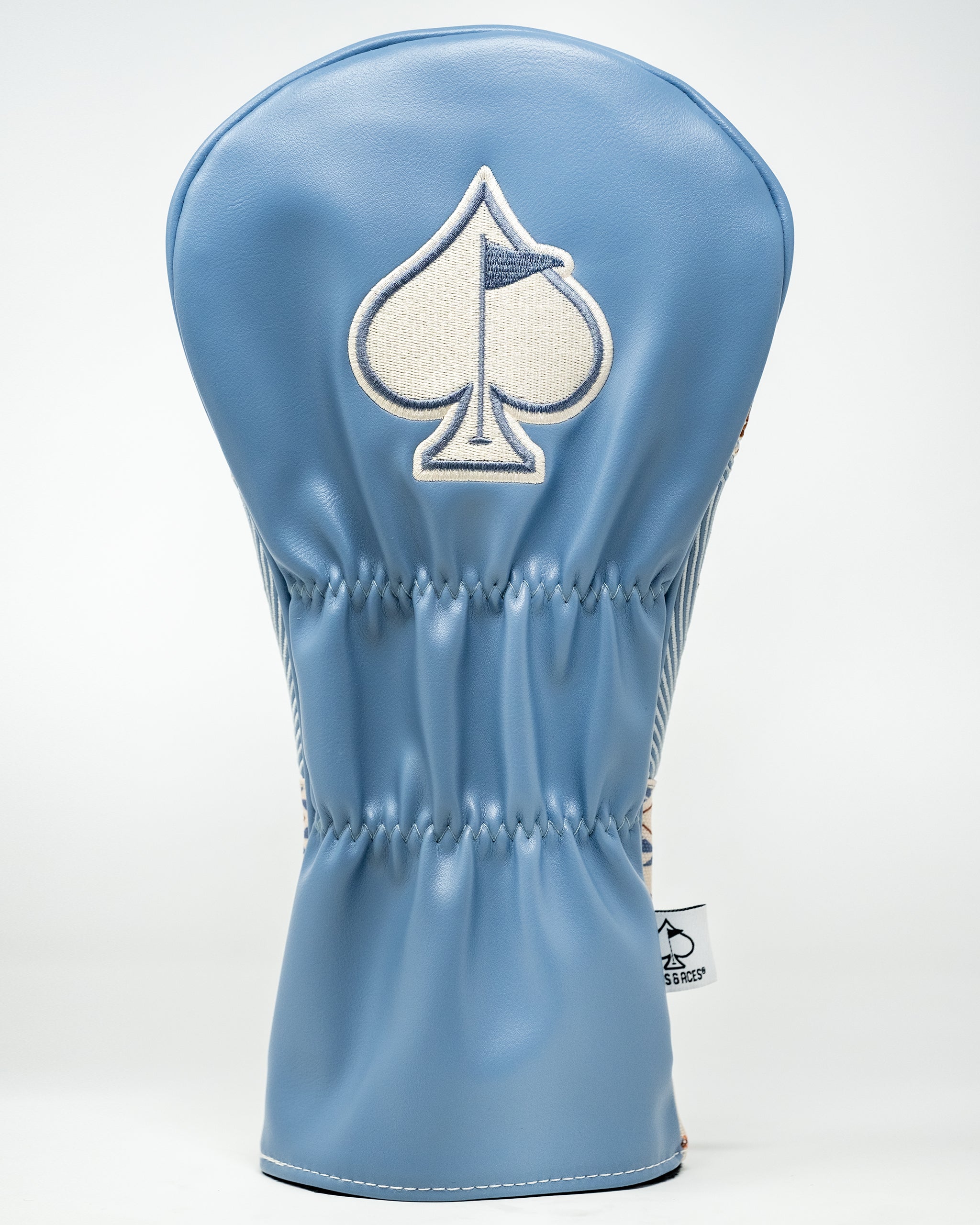 Western aesthetic driver cover featuring a rustic design with natural colors and a decorative fringe, ideal for golf enthusiasts.