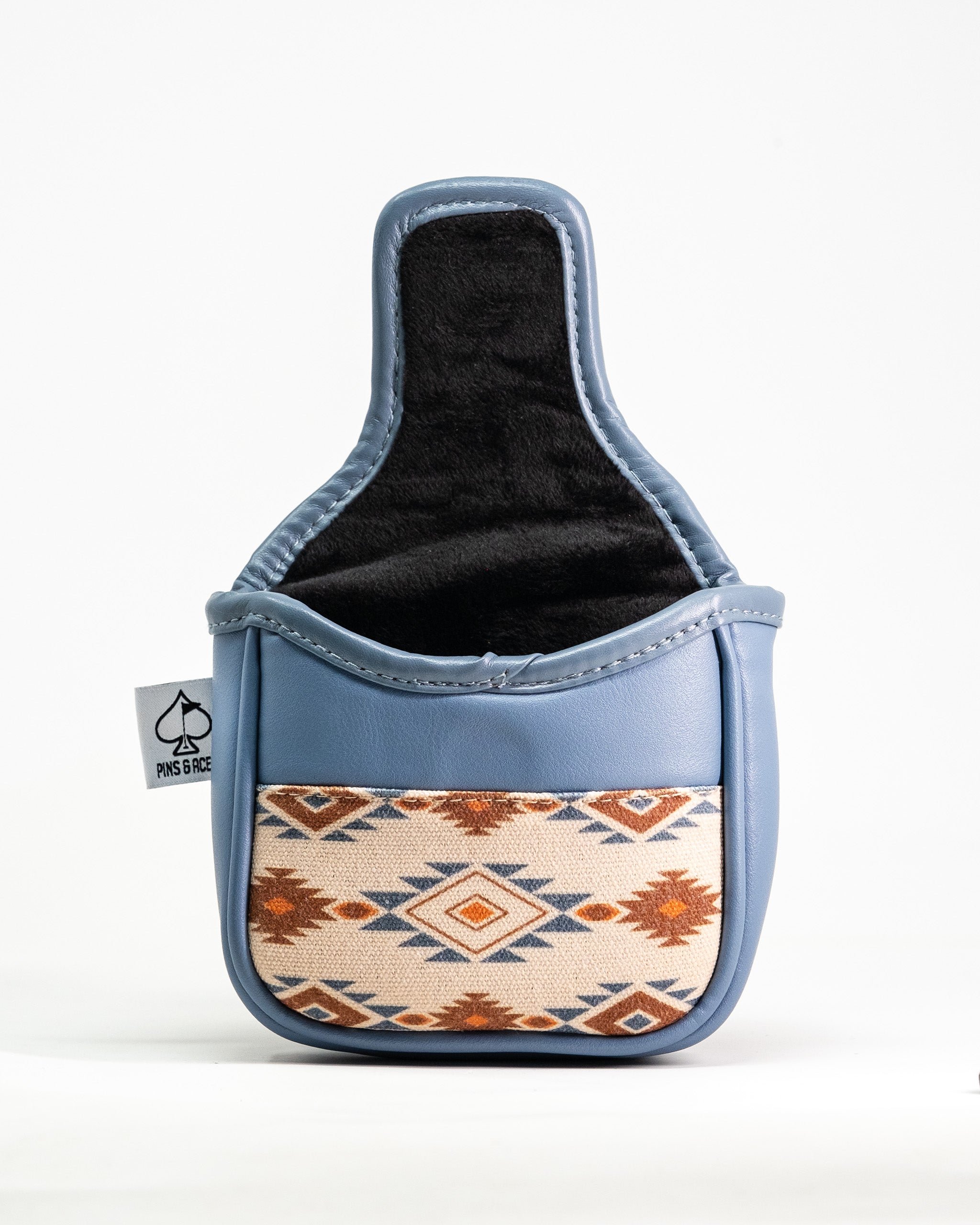 Western aesthetic mallet putter cover with a southwestern patterned fabric pocket and a soft black interior.