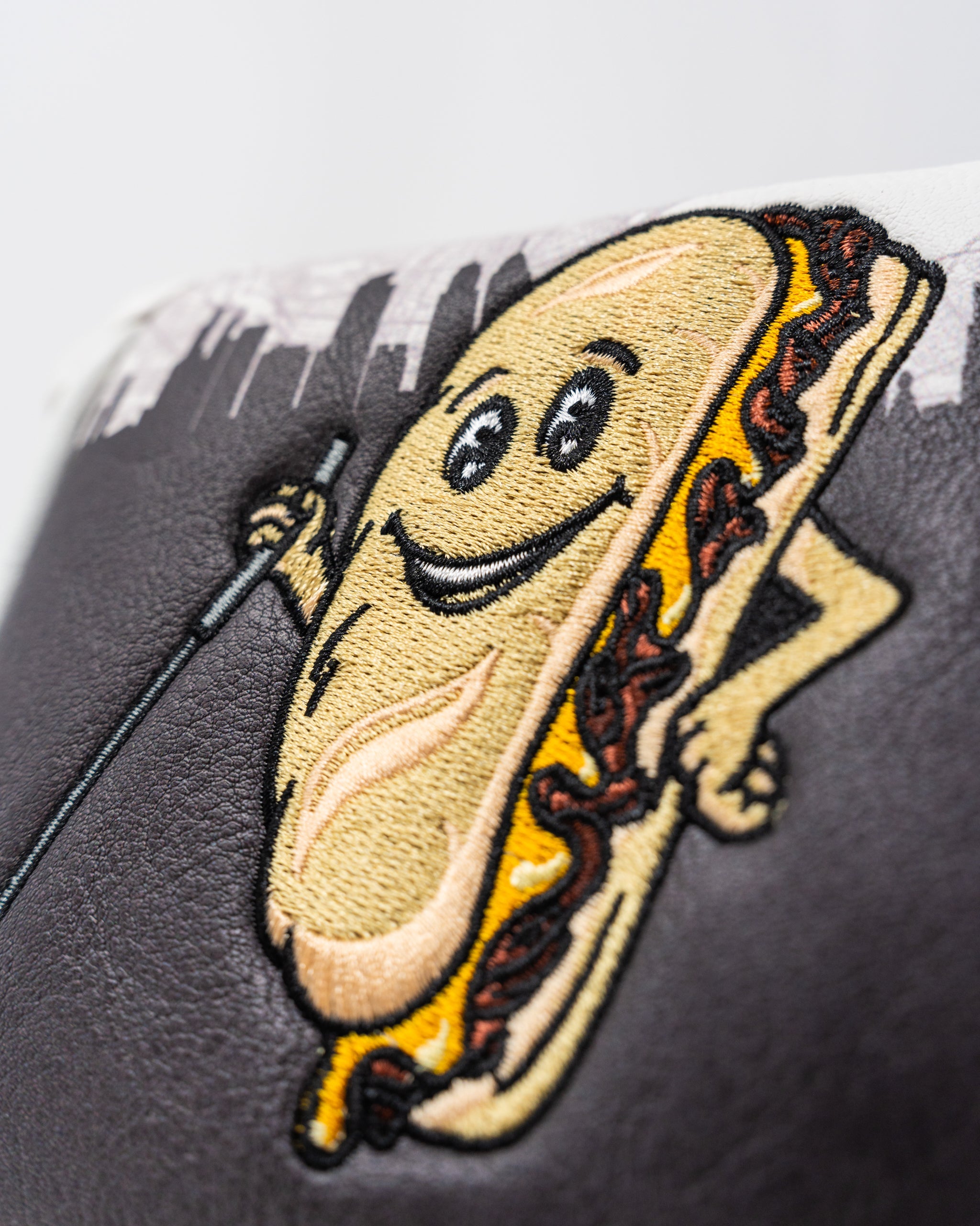 Whiz Wit Mallet Cover featuring a vibrant design, durable fabric, and secure elastic band for golf club protection.